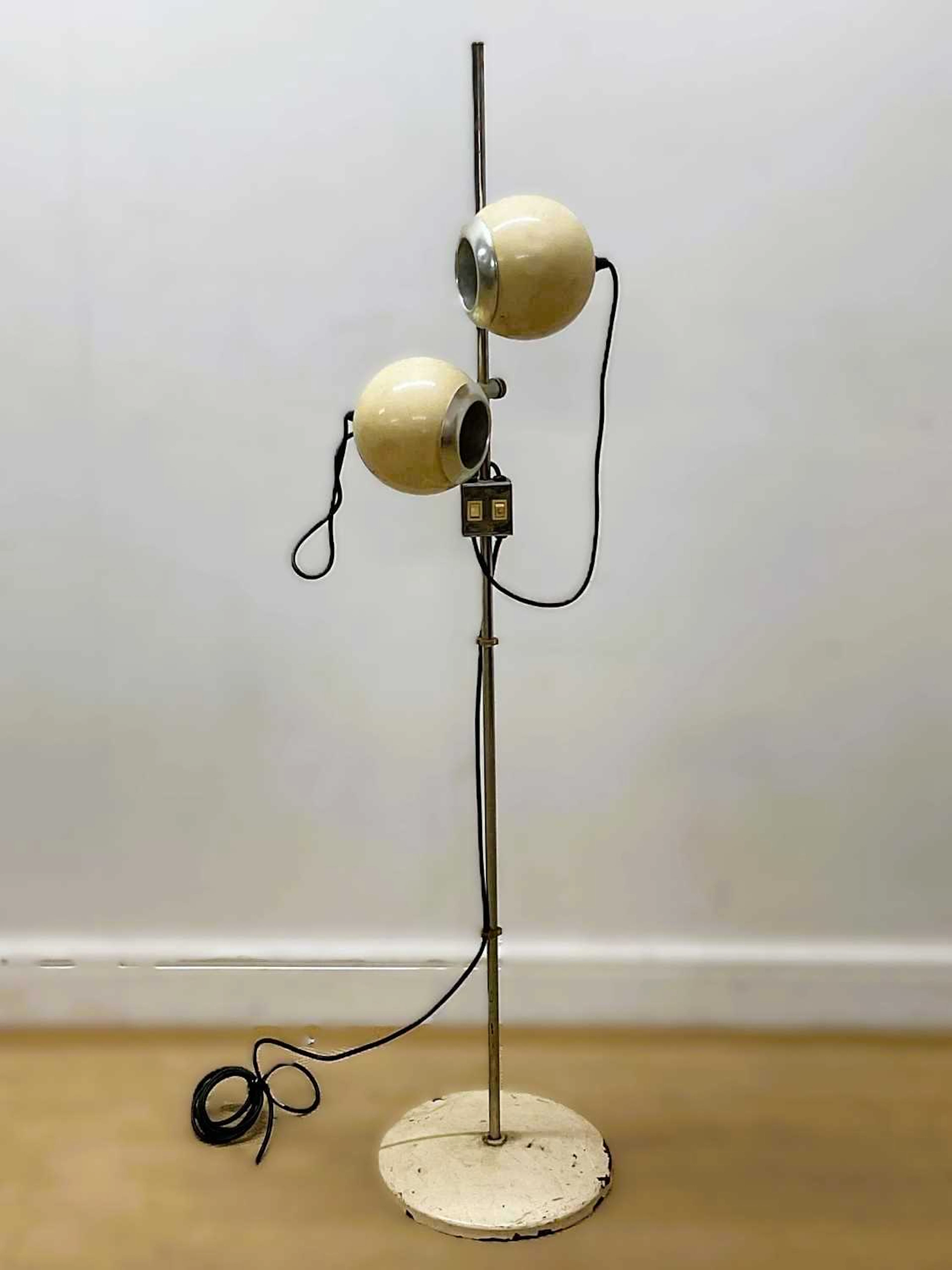 A 1970s space age floor lamp with adjustable eyeball...
