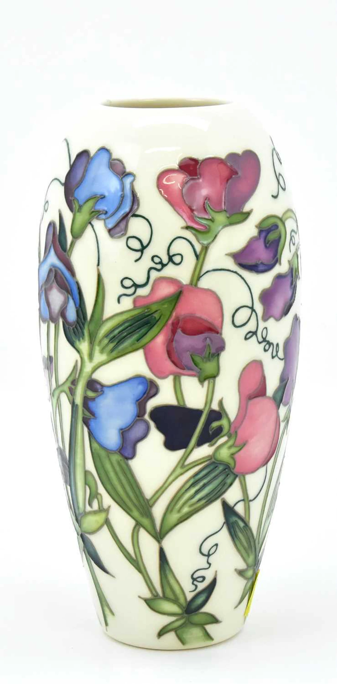MOORCROFT; a 'Sweetness' pattern vase of tapered form...
