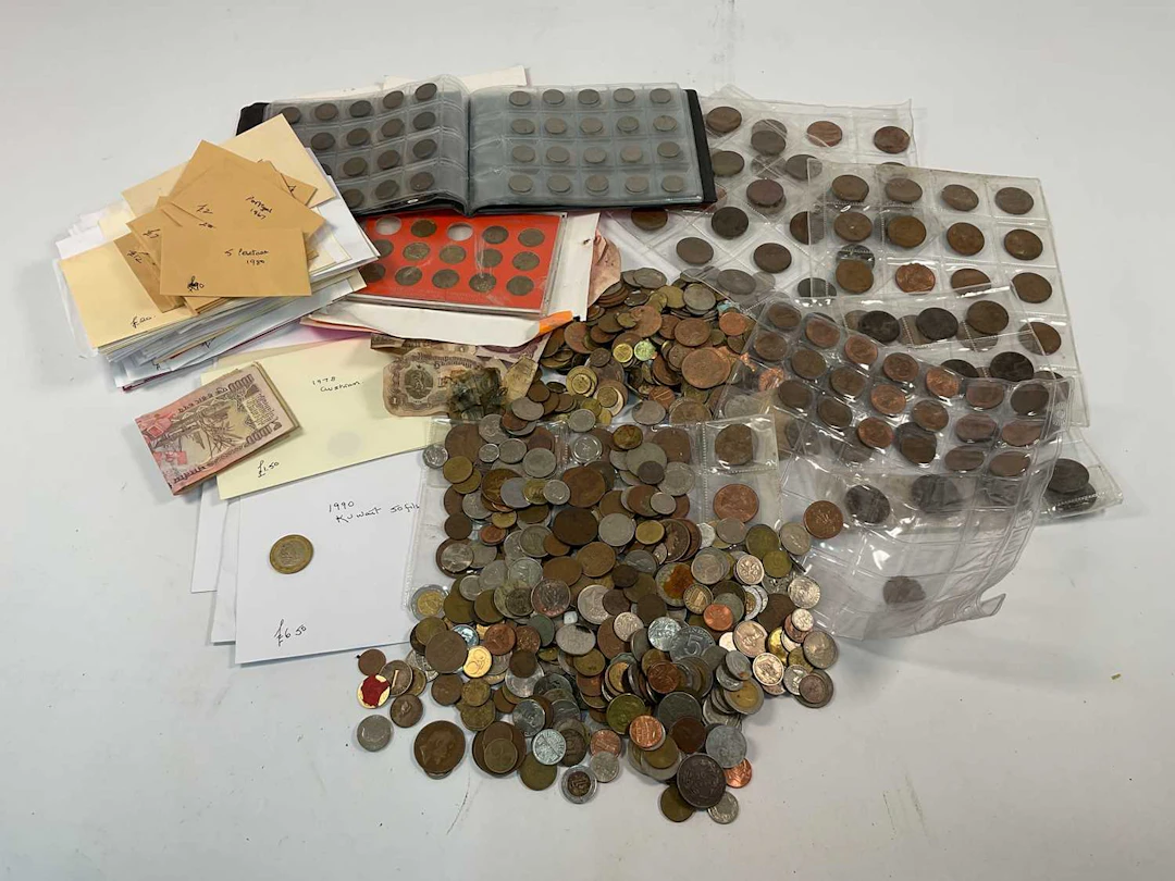 A large quantity of British and world wide coins and notes