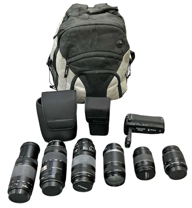 A quantity of assorted camera lenses
