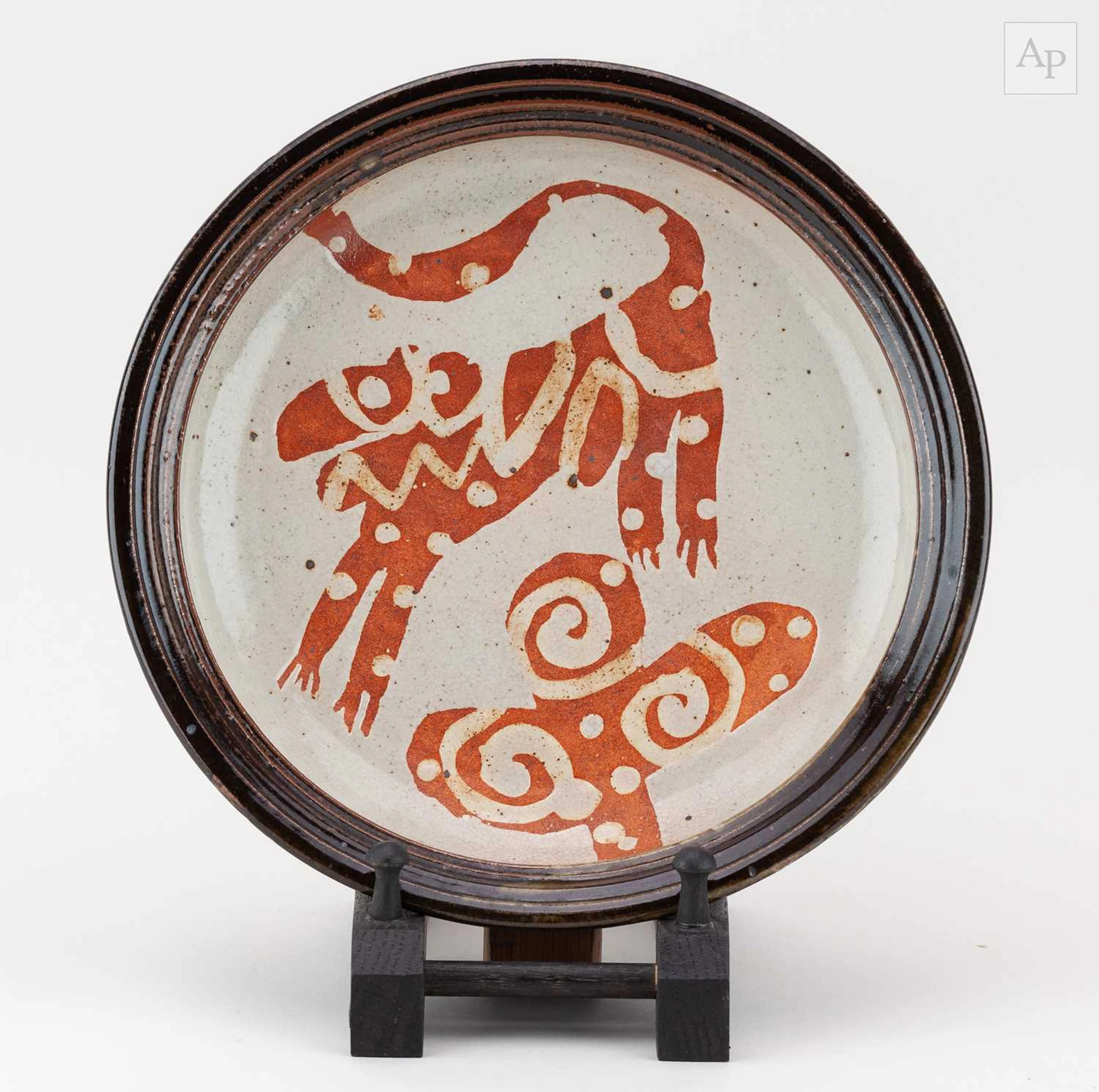JOHN MALTBY (1936-2020); a stoneware dish decorated with a stylised dog
