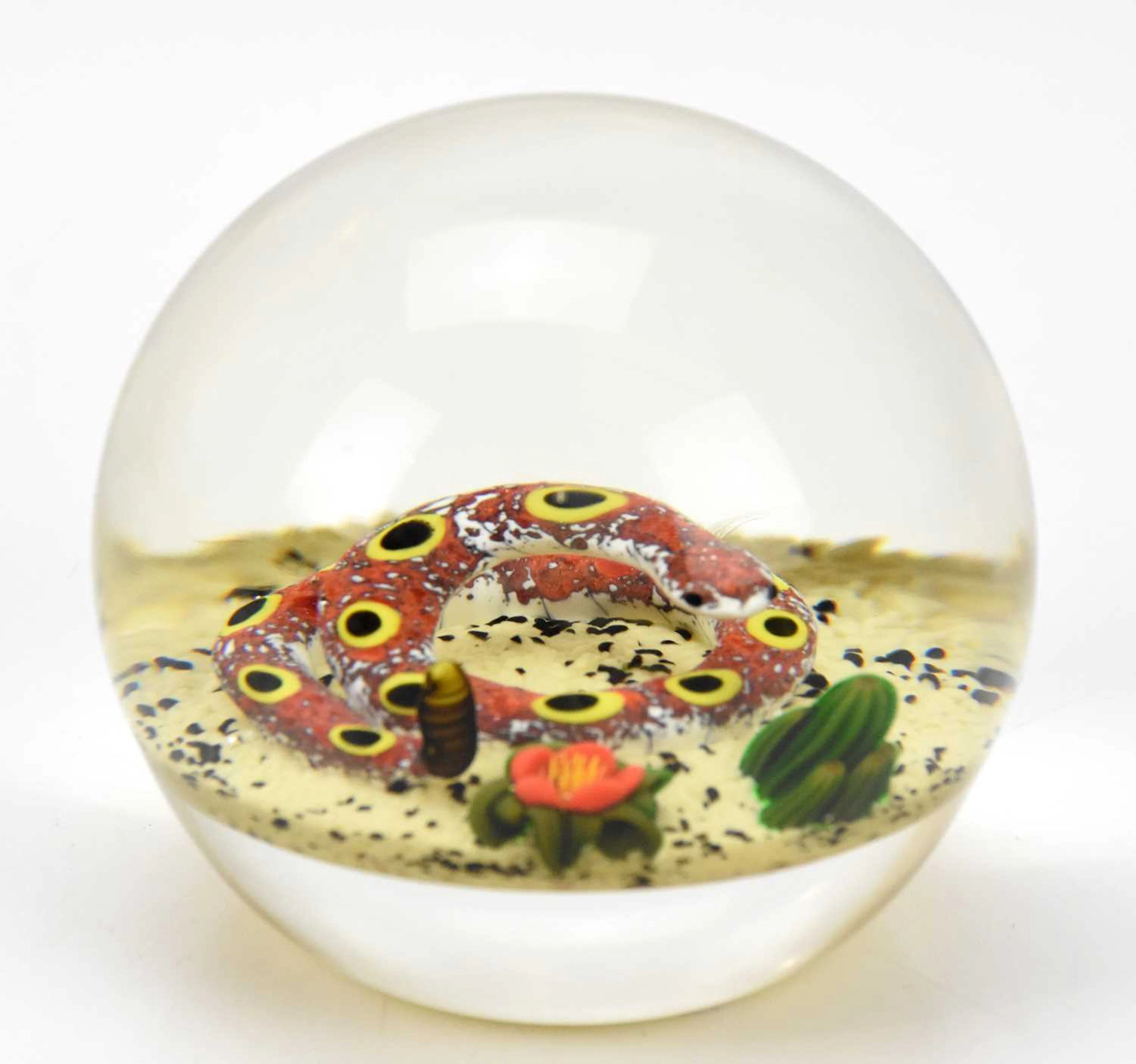 PERTHSHIRE; a rare paperweight with a coiled yellow and...