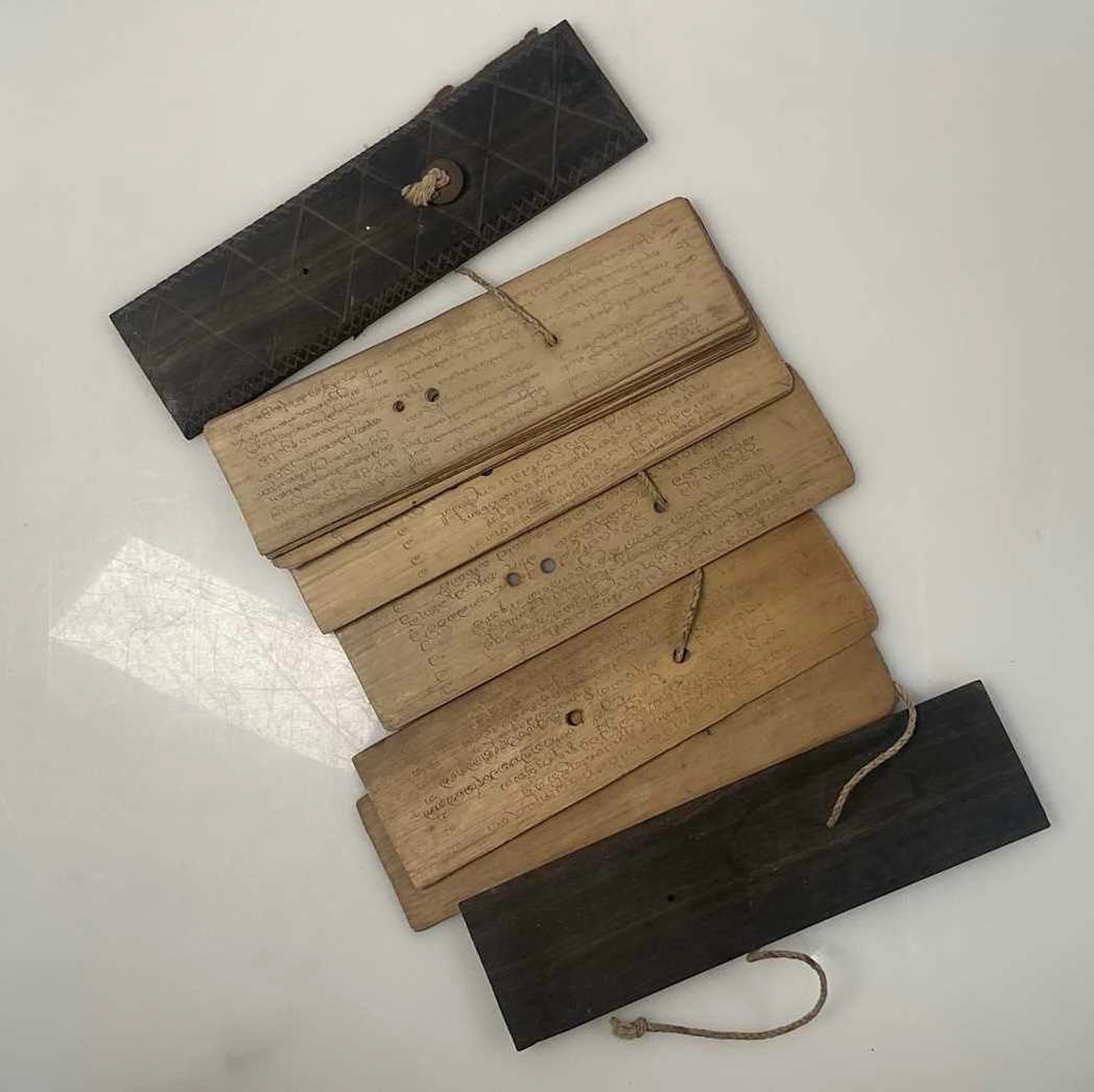 A palm leaf book with Buddhist manuscript on...