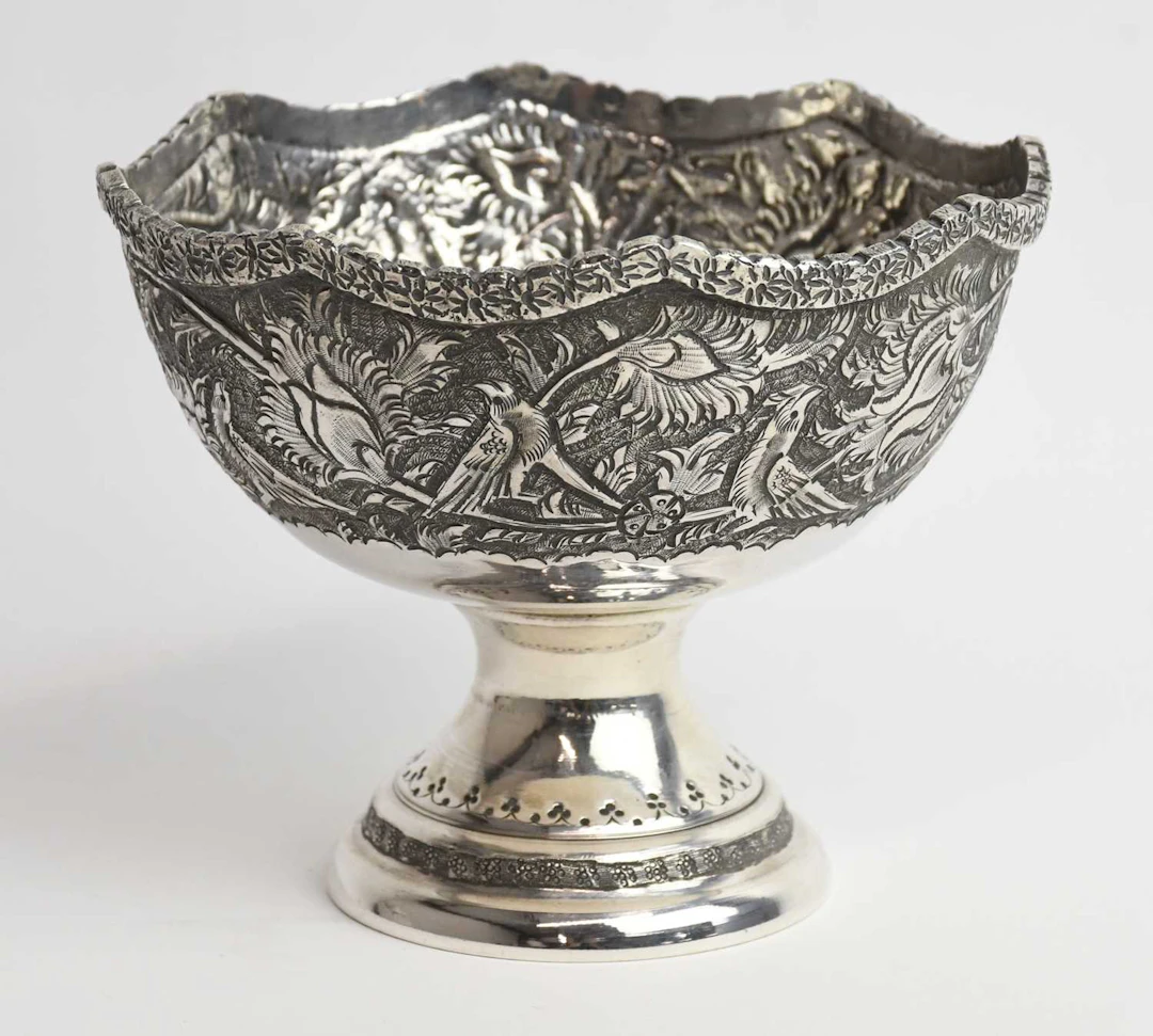 An early 20th century Middle Eastern white metal footed circular bowl