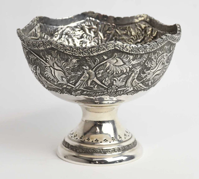 An early 20th century Middle Eastern white metal footed circular bowl