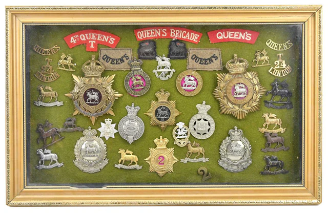 MILITARY INTEREST; a collection of military badges and...