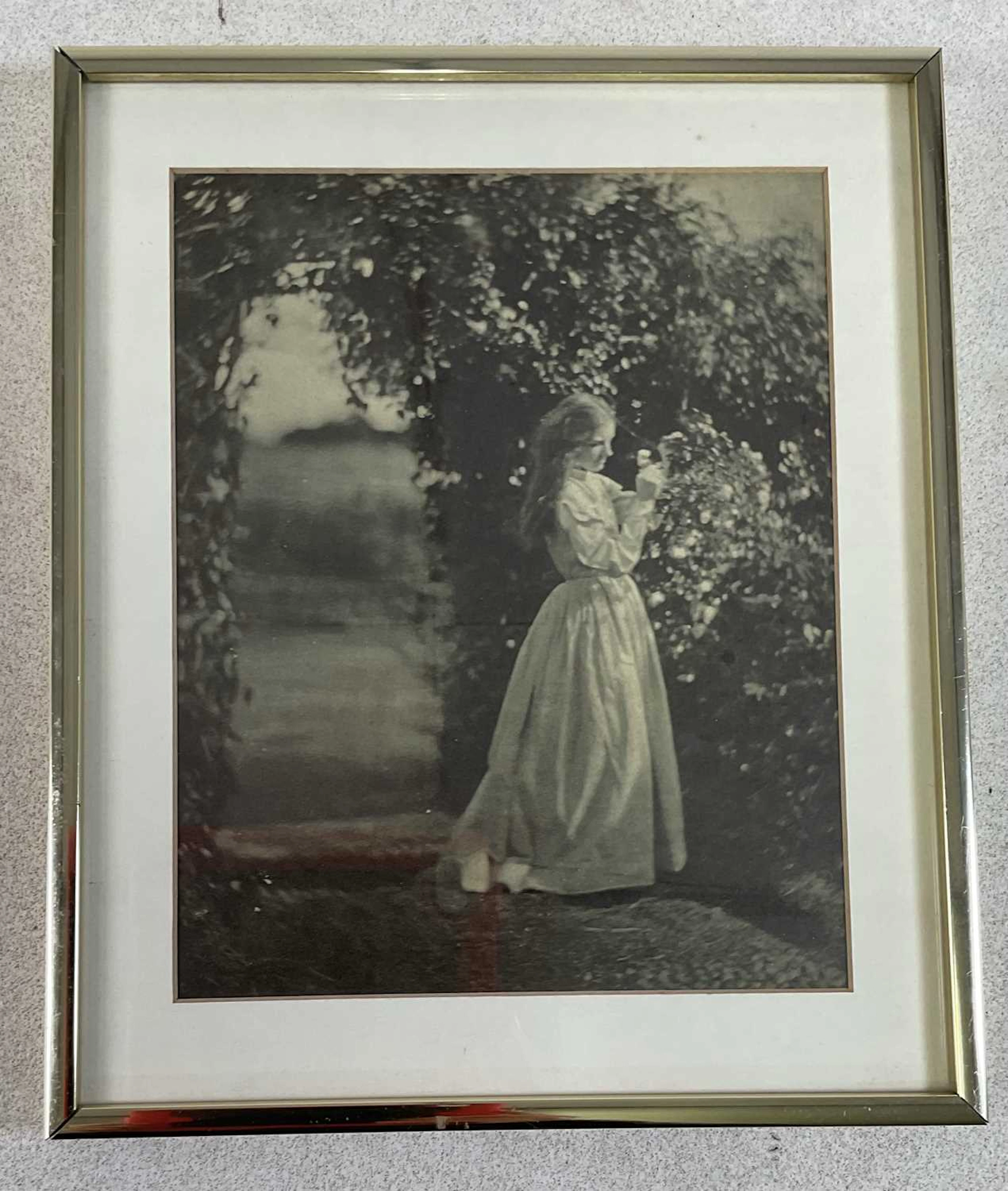 AFTER JULIA MARGARET CAMERON (1815-1879); a black and white photograph