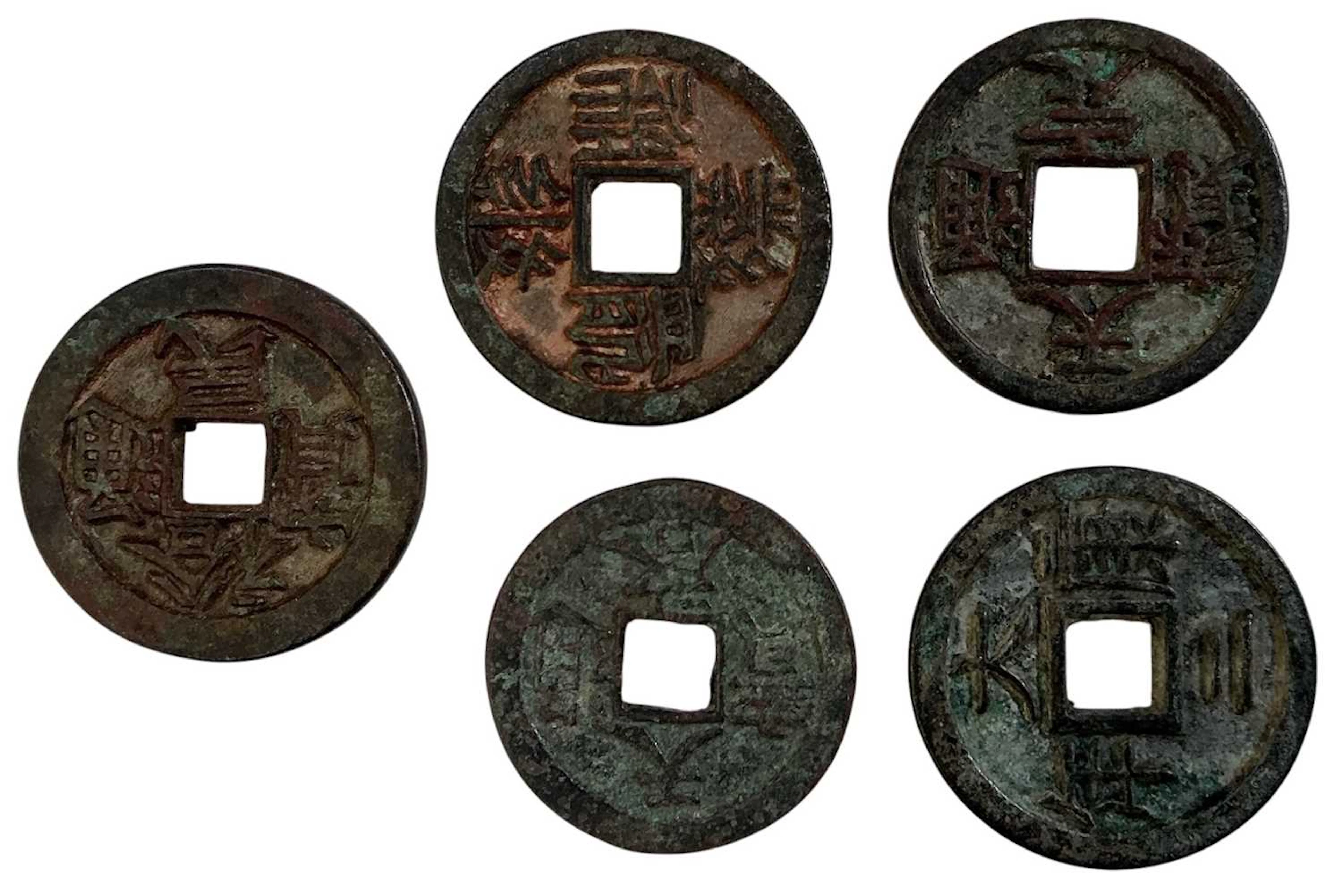 Five assorted Chinese bronze coins and tokens