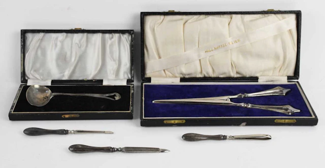 An Elizabeth II hallmarked silver sauce ladle