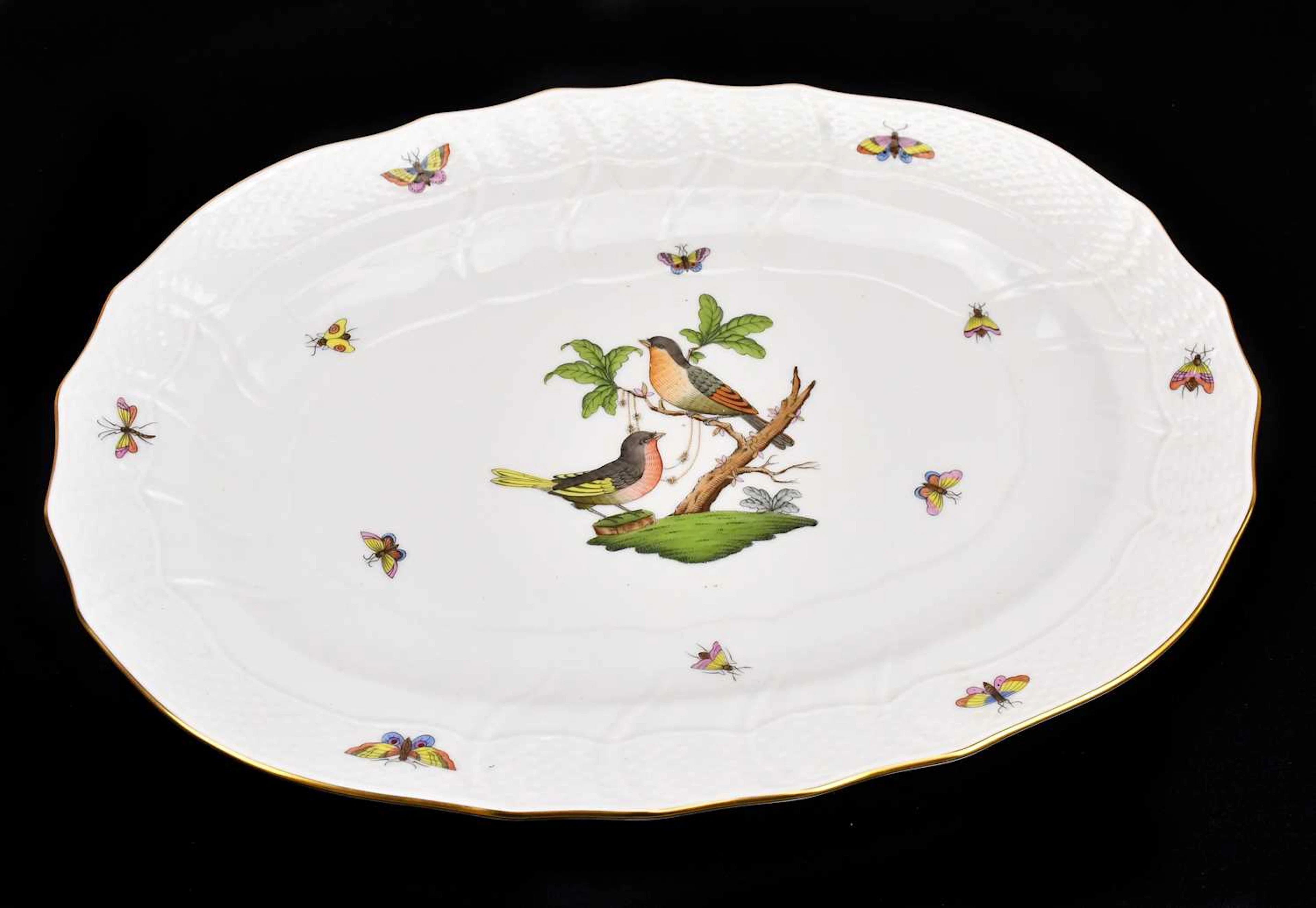 HEREND; a hand painted platter of shaped form with scalloped edge