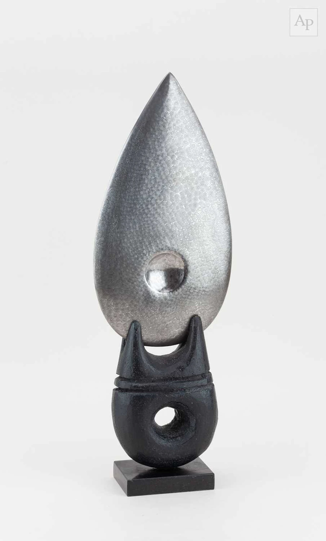 PETER HAYES (born 1946); a polished Damascus steel blade...