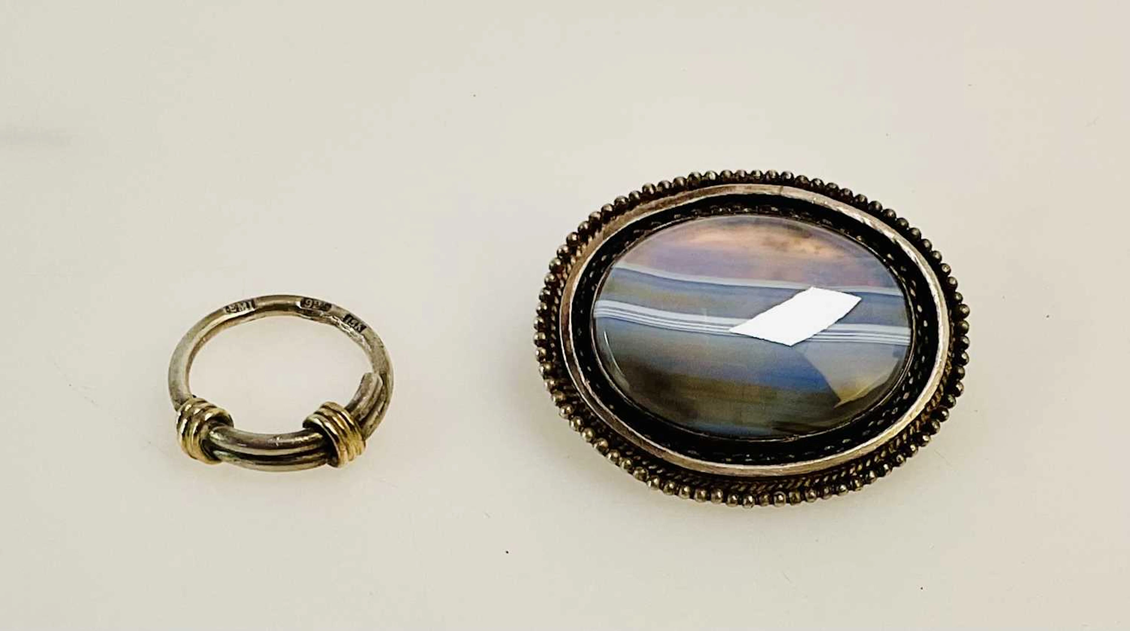 A 925 silver 18ct yellow gold mounted band ring