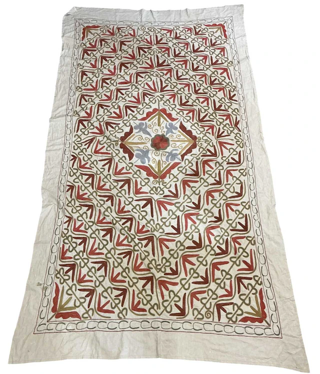 An antique Turkish embroidered florally decorated woollen wall hanging panel
