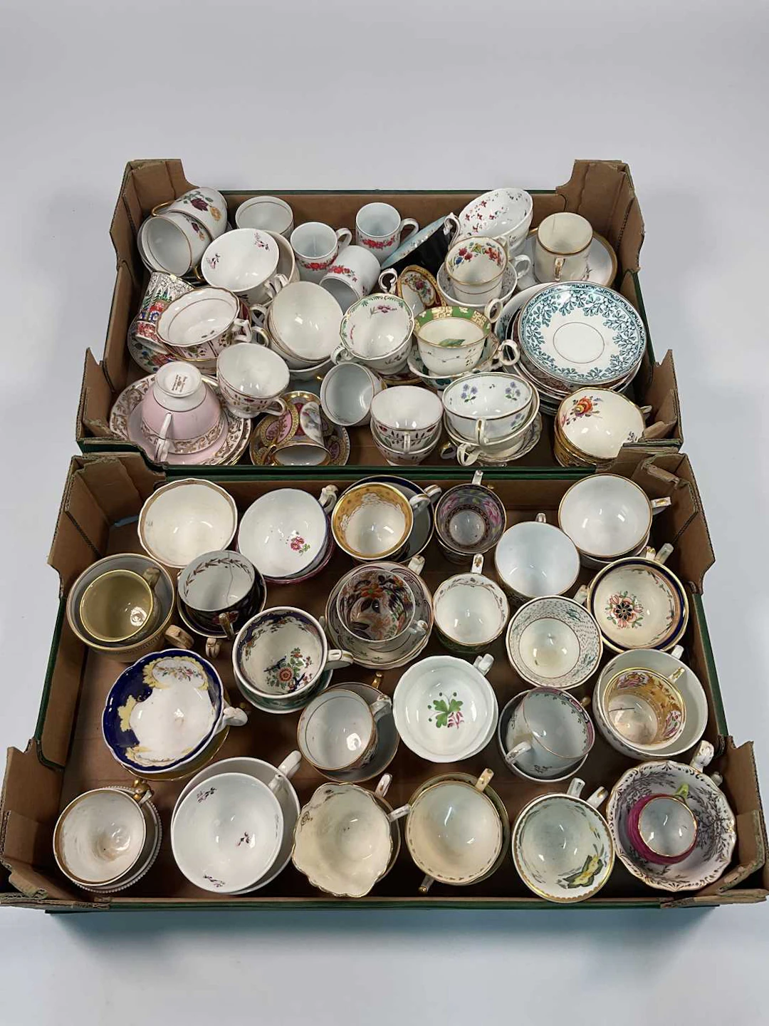A quantity of 19th and 20th century porcelain teacups and saucers