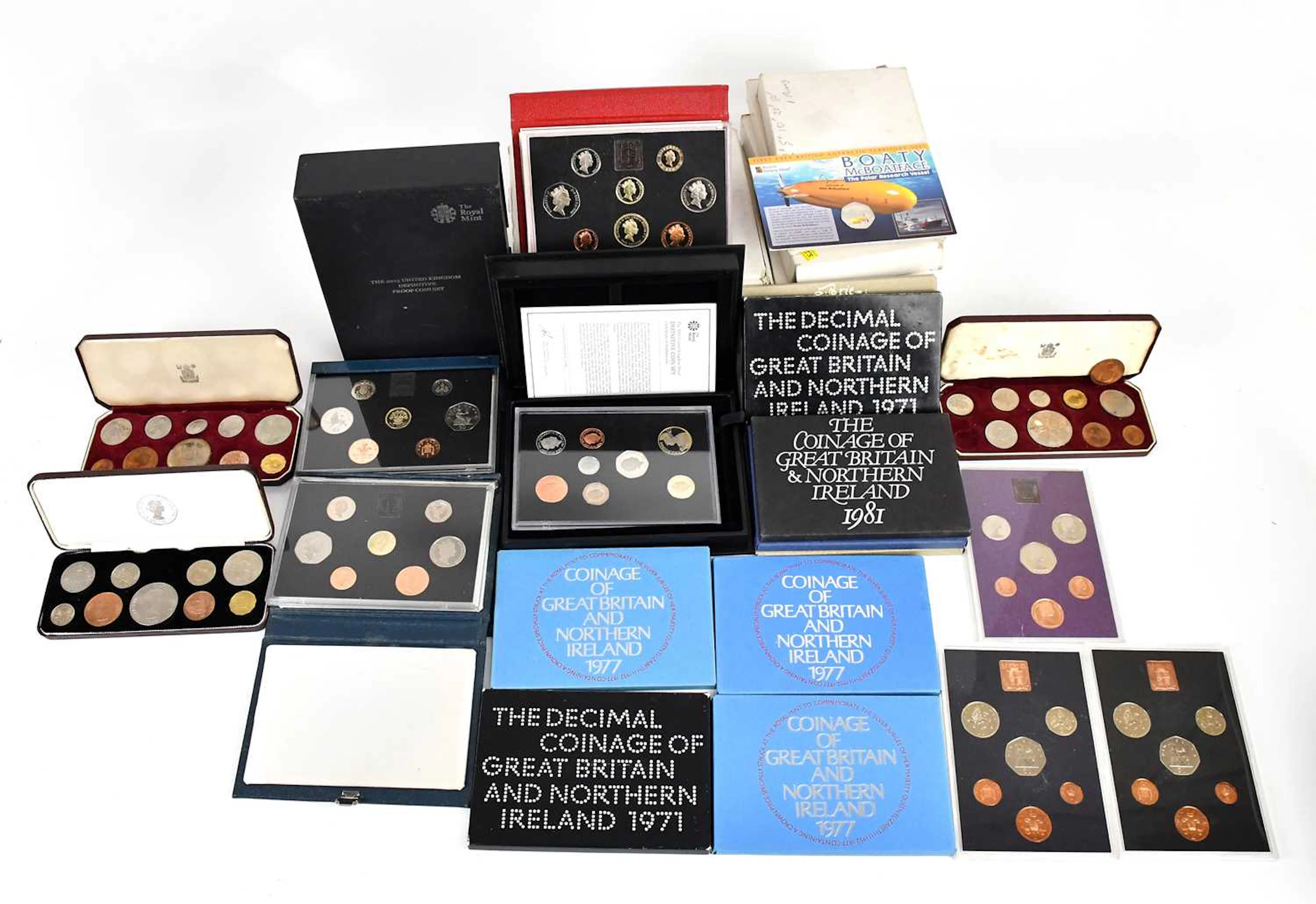 A collection of various coin sets