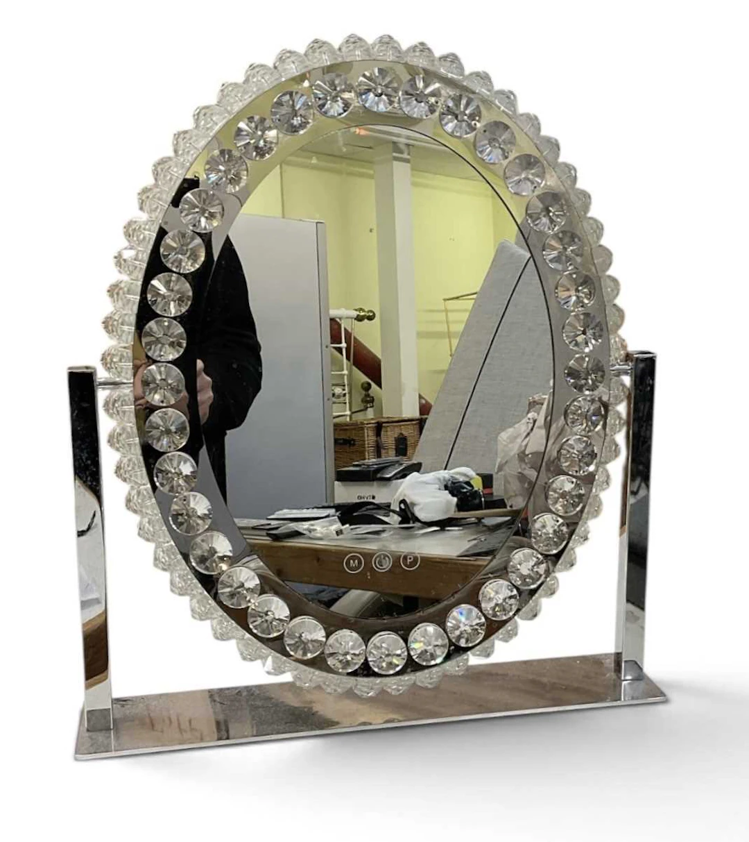 A modern contemporary chrome stainless steel oval...