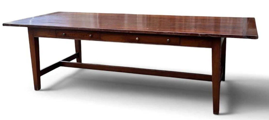 A reproduction mahogany refectory type rectangular dining table