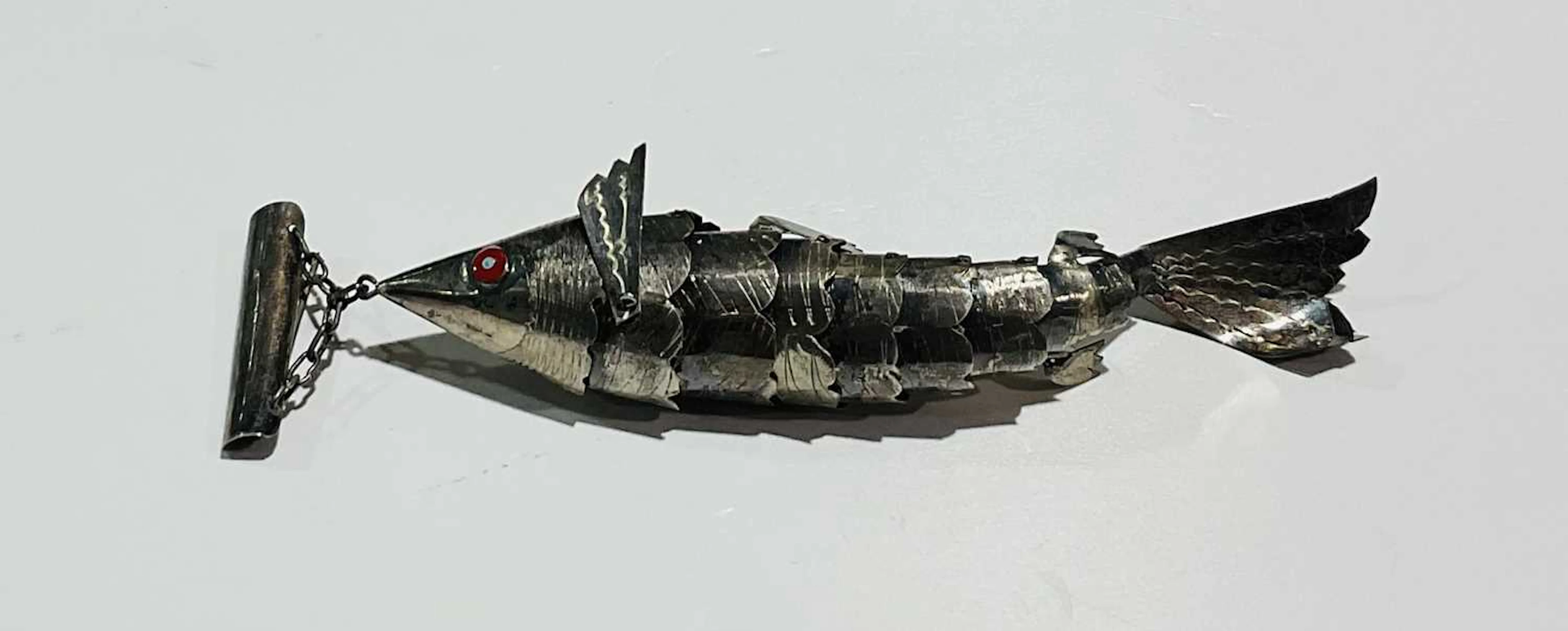 A Peruvian white metal fish