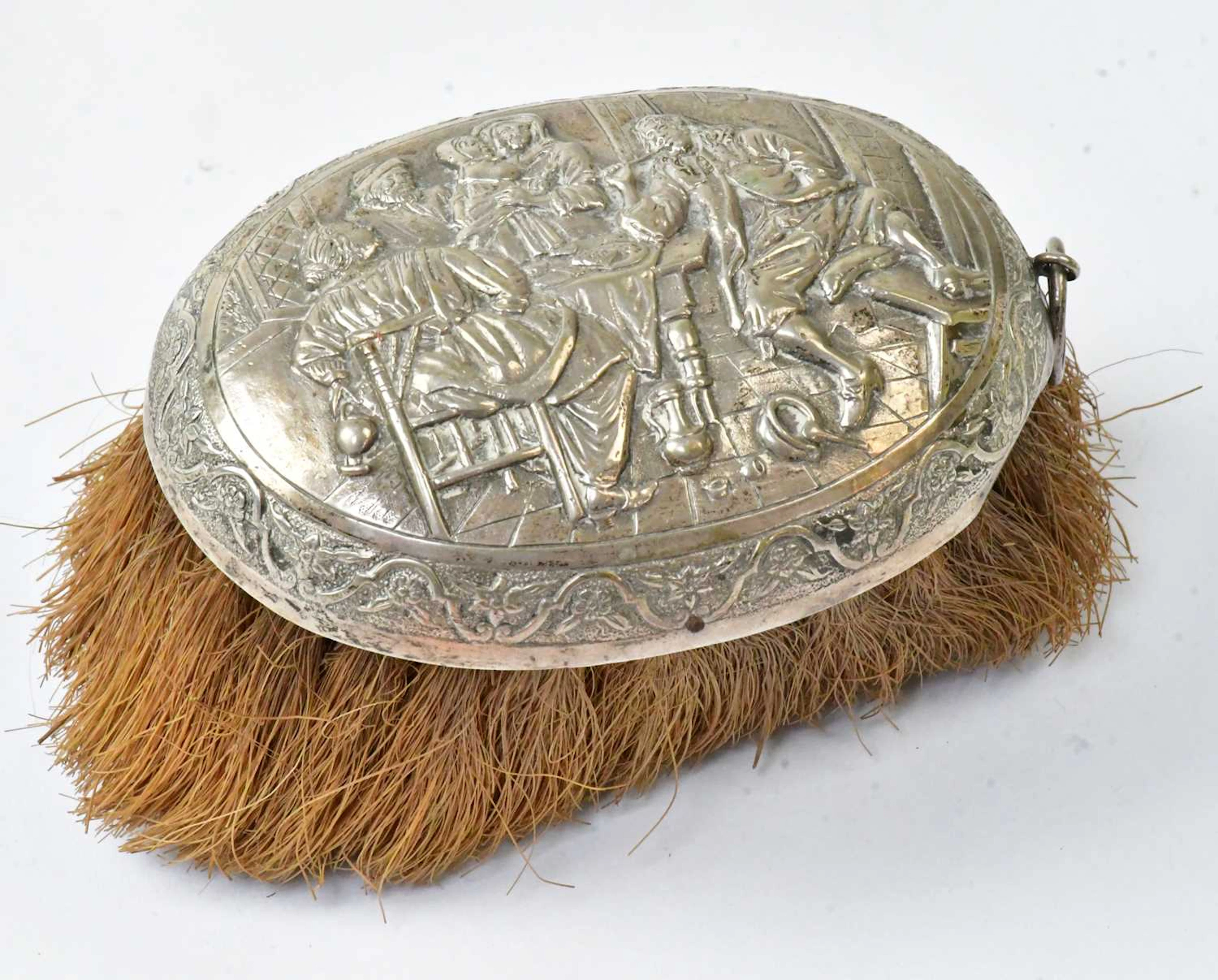 A 19th century Dutch silver-backed clothes brush