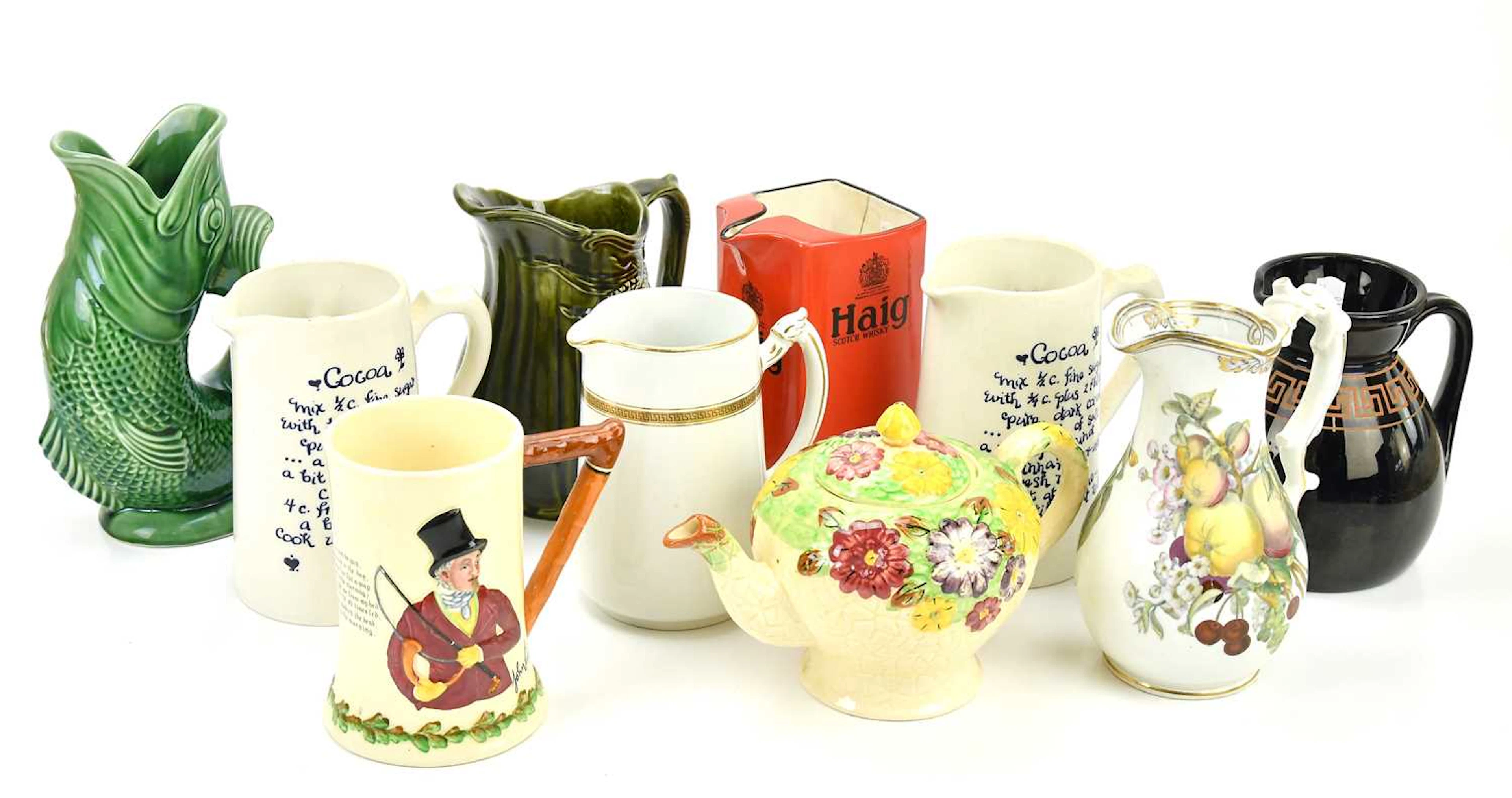 A collection of decorative ceramic jugs