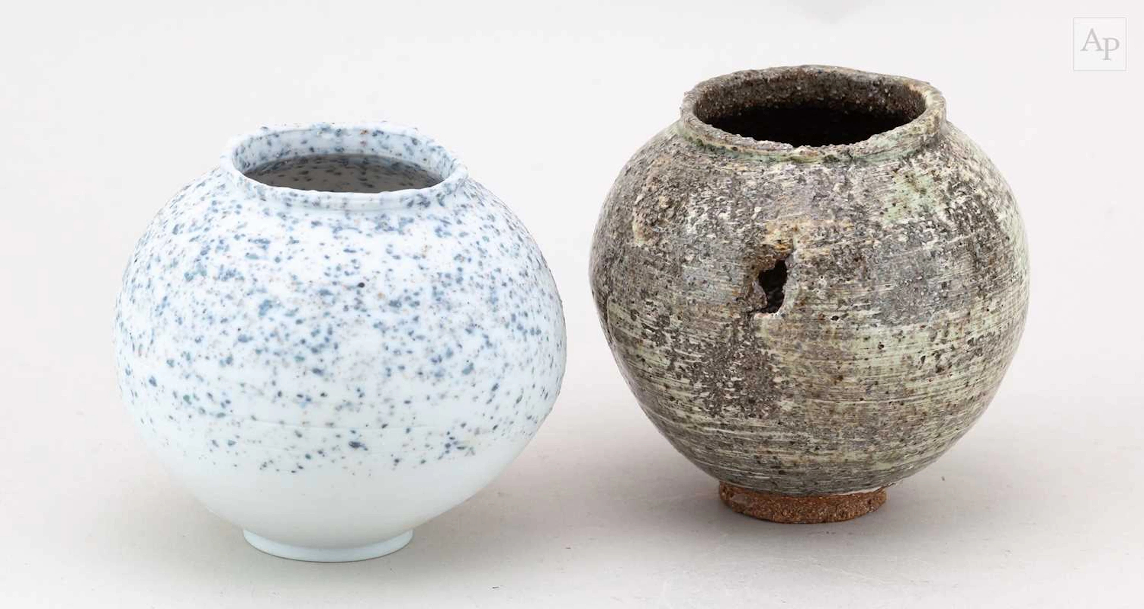 ADAM BUICK (born 1978); a pierced stoneware mini moon jar...