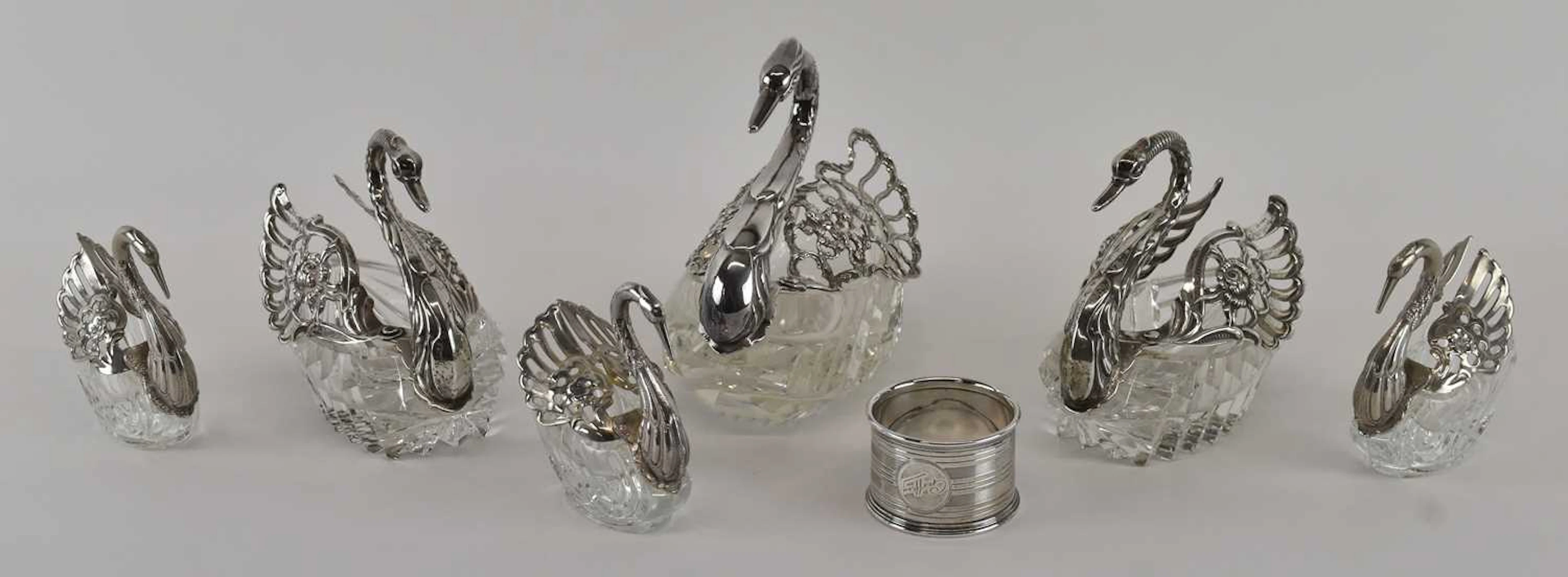 A graduated set of six cut glass and 925 silver mounted...