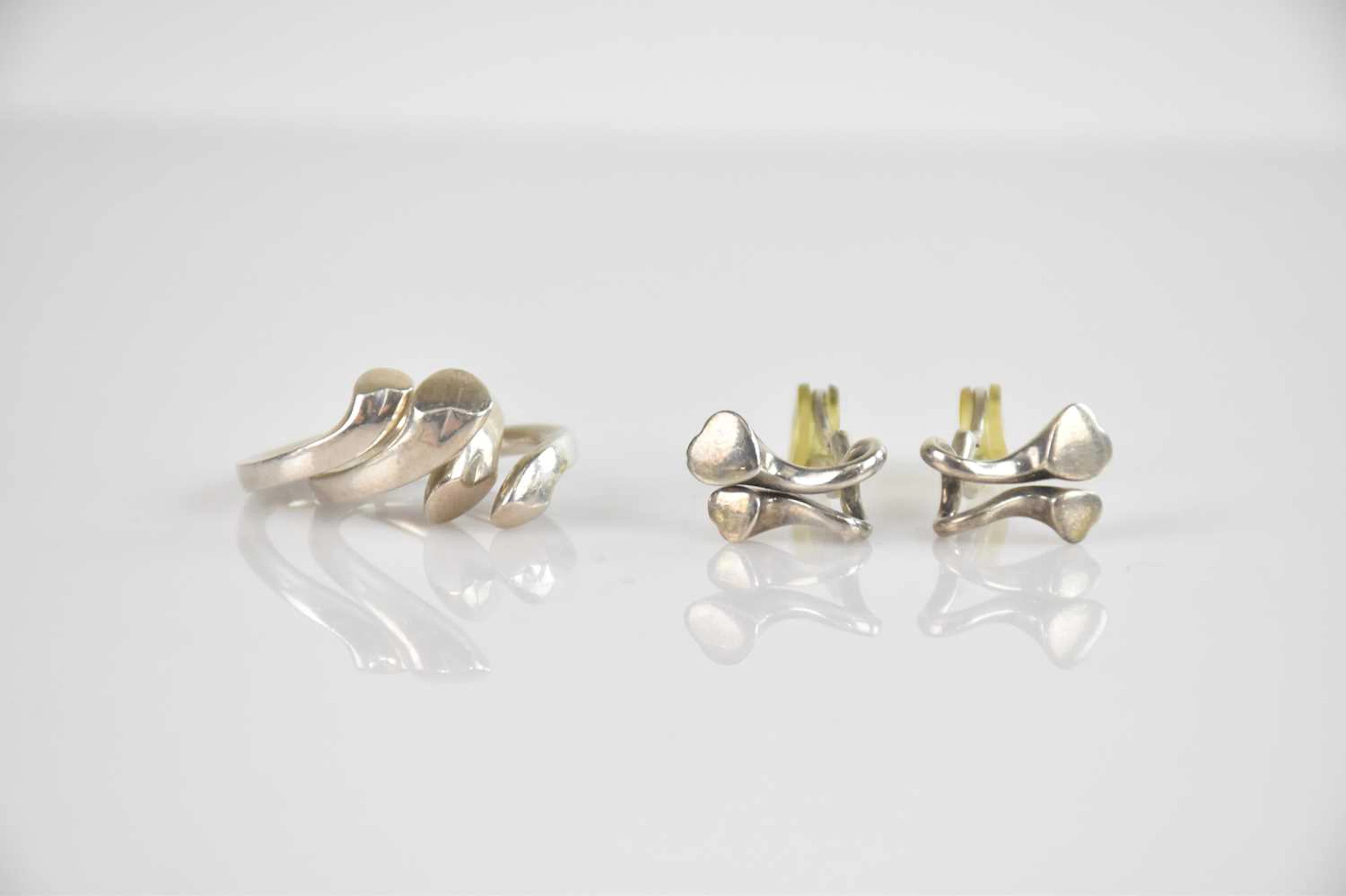 ALLAN SCHARFF FOR GEORG JENSEN; two sterling silver rings
