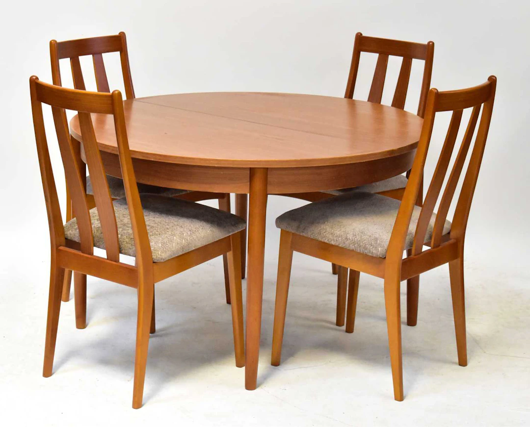 G-PLAN; a mid-20th century teak circular extending dining table