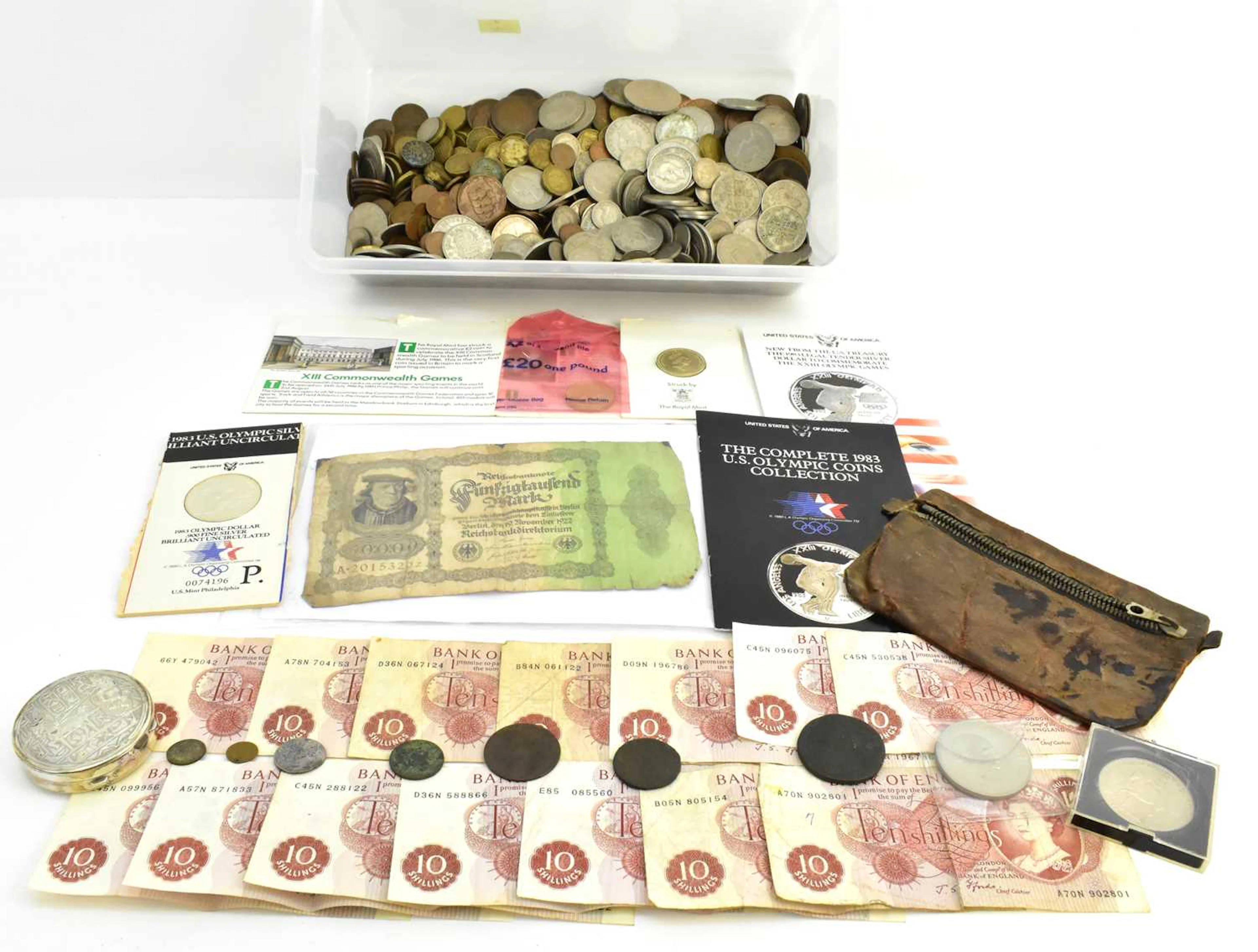 A collection of various UK coinage including halfpennies