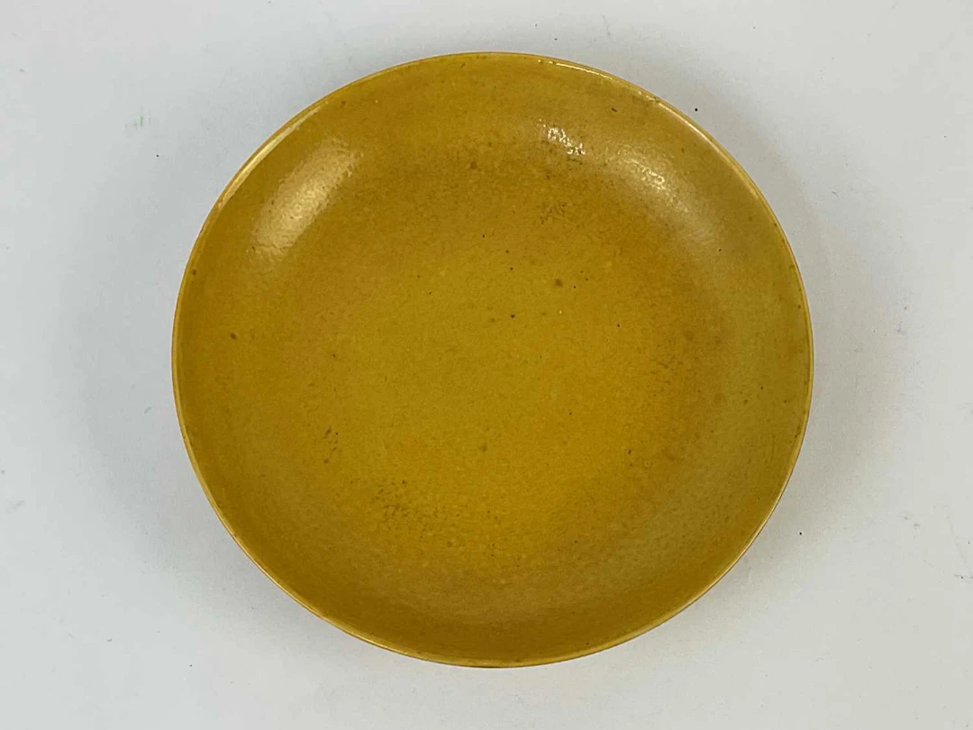 A Chinese yellow glazed dish