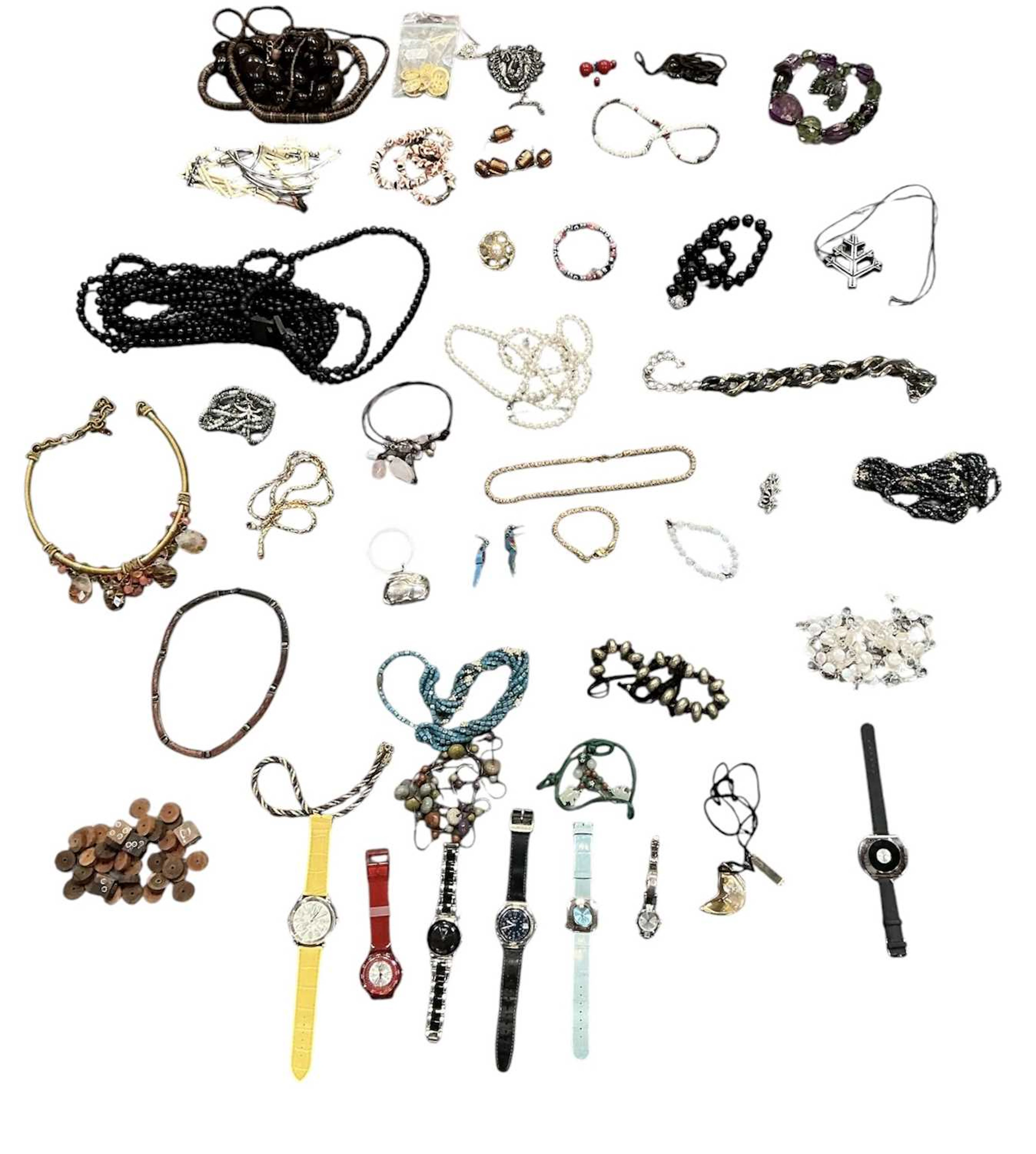 A large quantity of assorted costume jewellery and watches