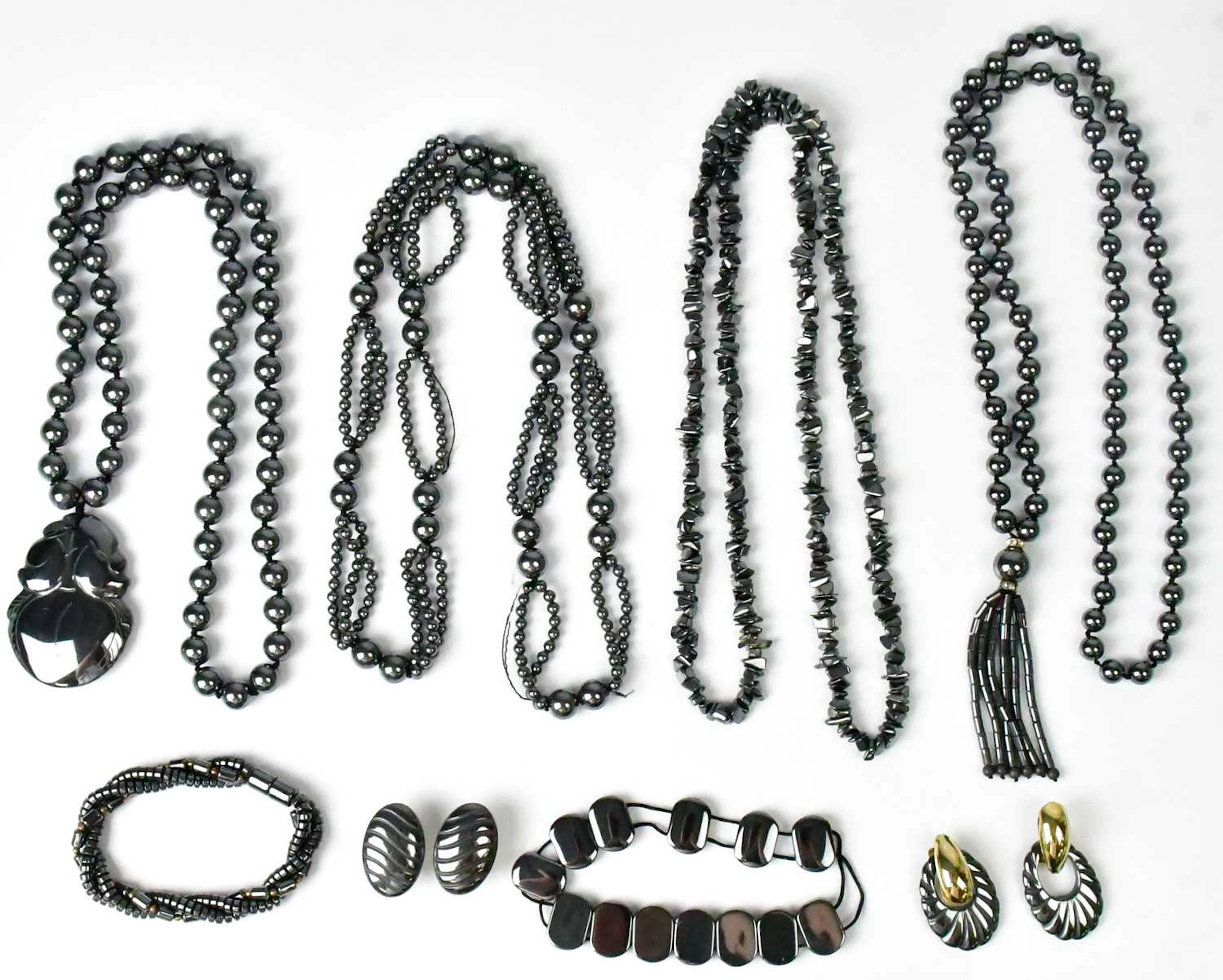 A group of hematite jewellery
