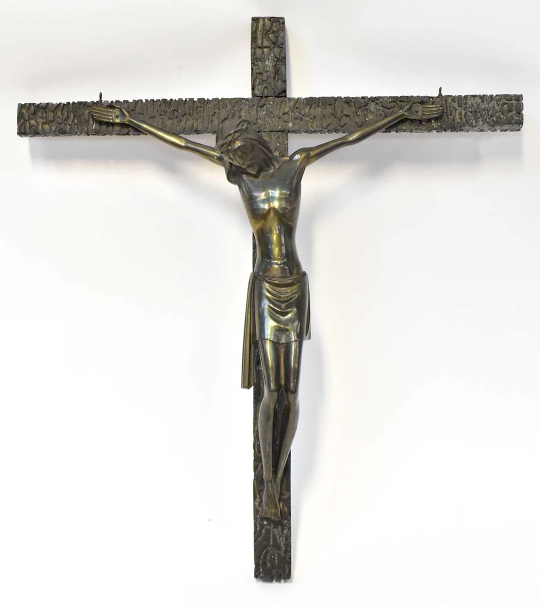 A mid-20th century German bronze sculpture of Christ on the cross