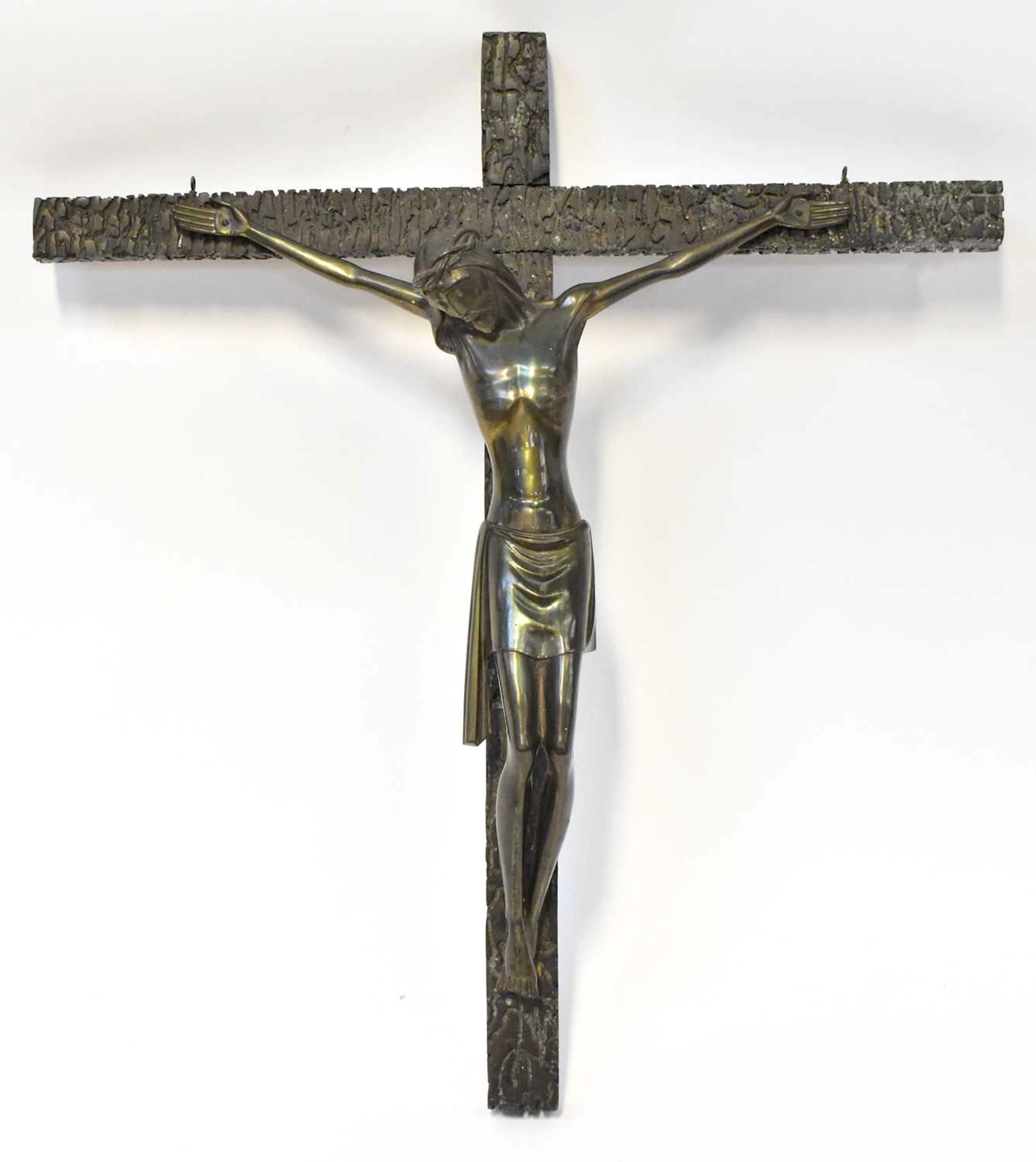 A mid-20th century German bronze sculpture of Christ on the cross
