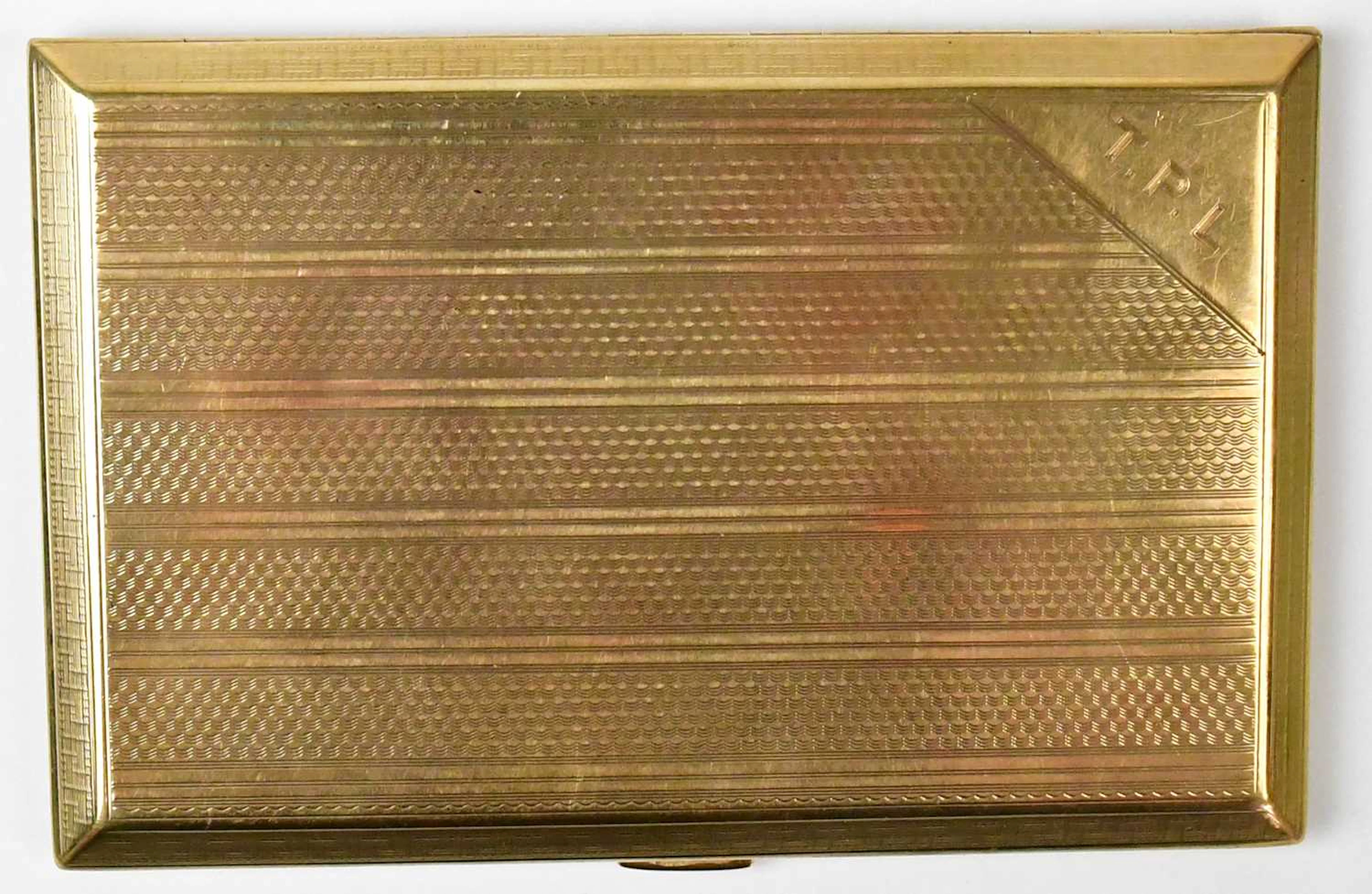 JOHN HENRY WYNN; a 9ct yellow gold cigarette case with...