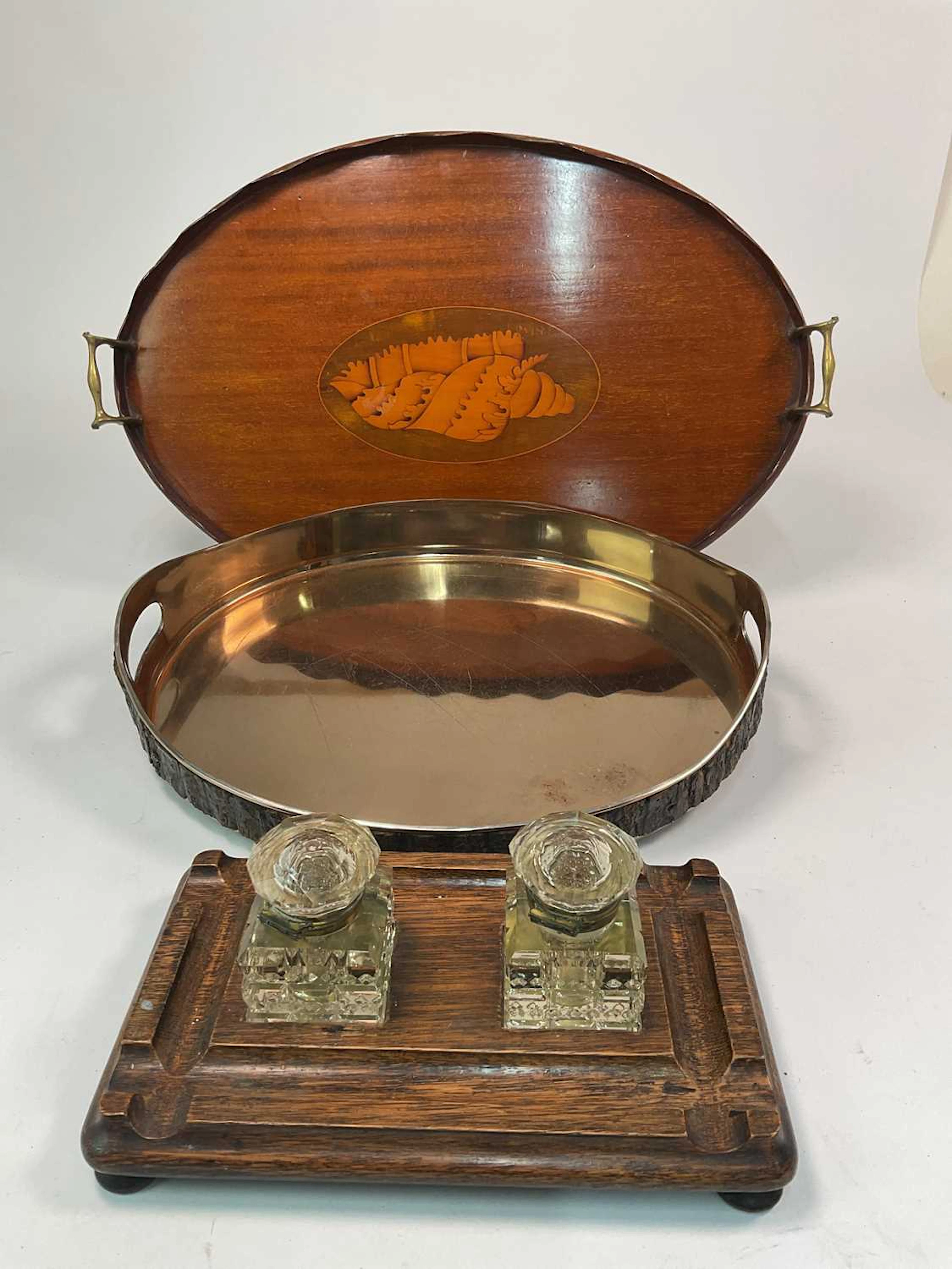 An Edwardian oval shell inlaid mahogany two handled tray