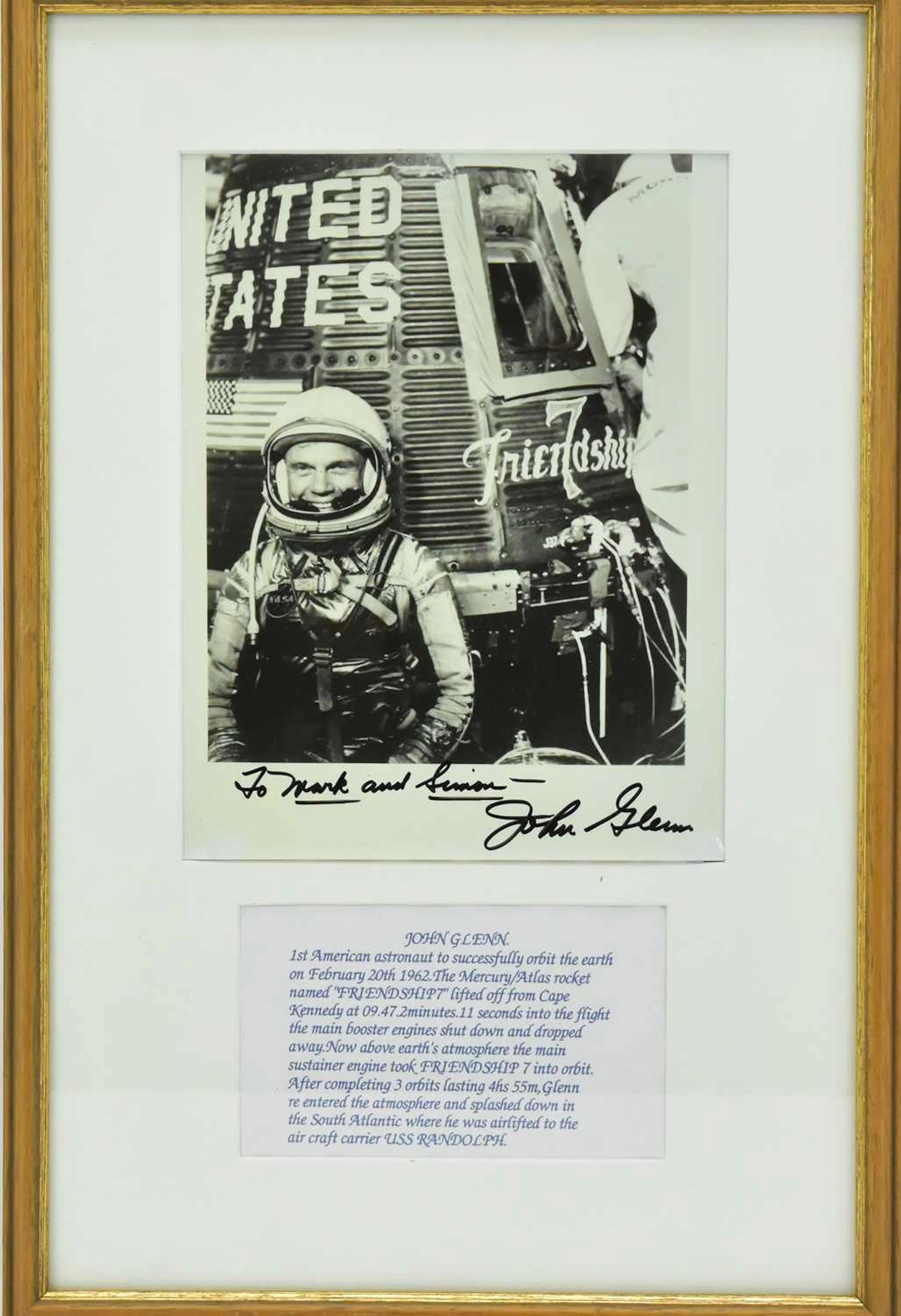 NASA; a John Glenn framed photo display featuring a photo...