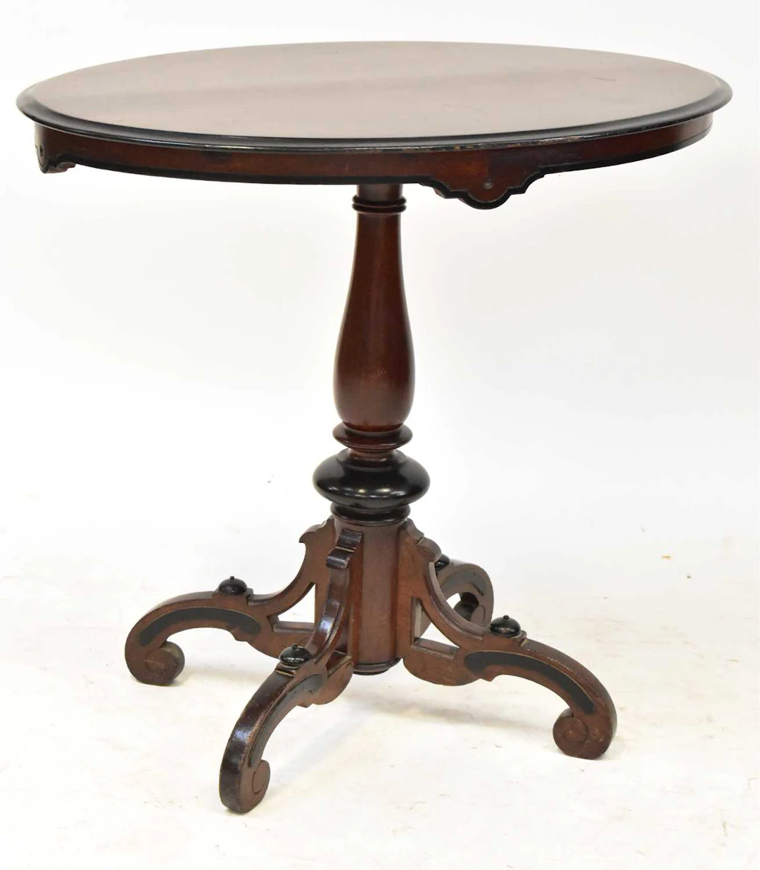 A 19th century inlaid mahogany oval-topped side table