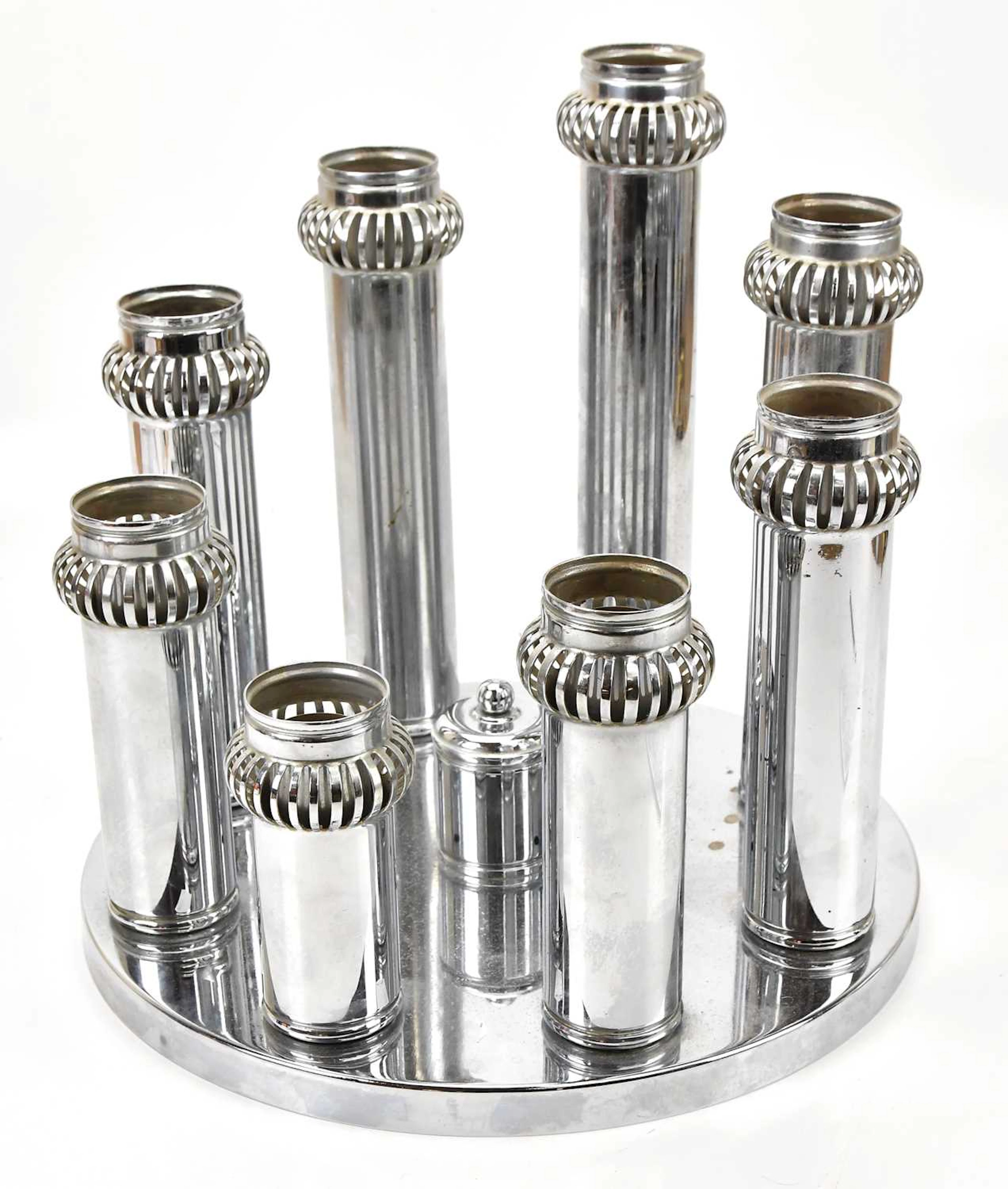 A mid century chrome plated light fitting with graduated tubes