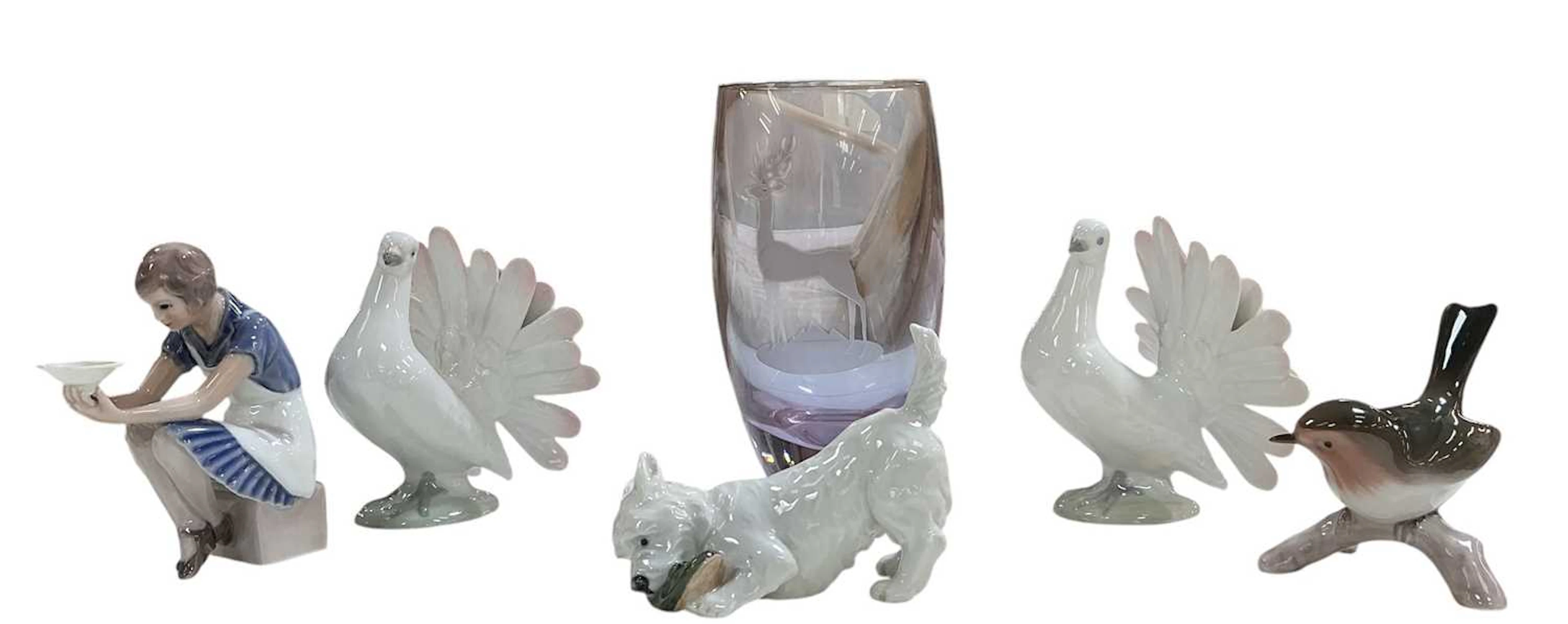 BING & GRONDAHL; two porcelain figures comprising a playful Yorkshire terrier