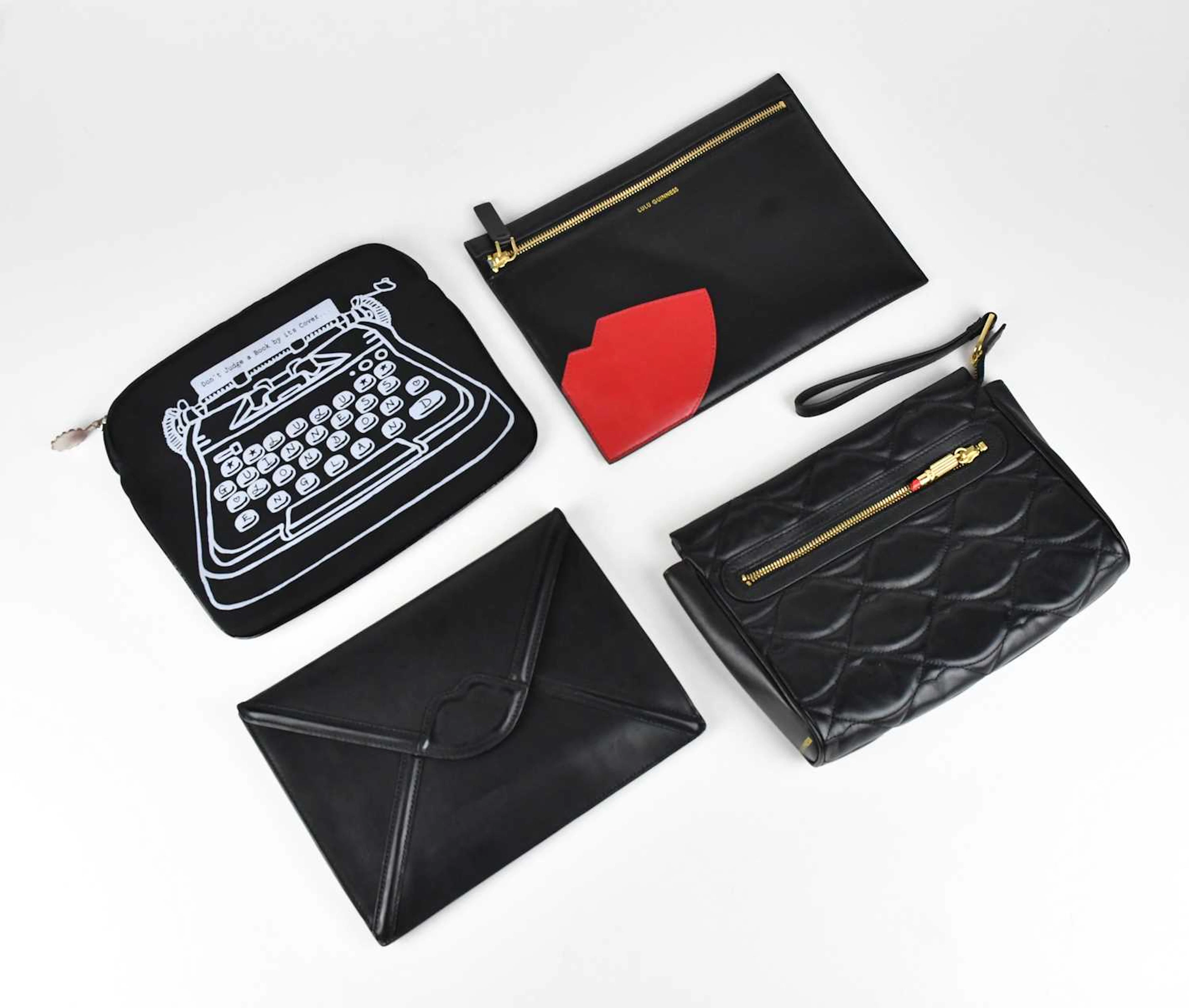 LULU GUINNESS; a black quilted leather pouch with gold...