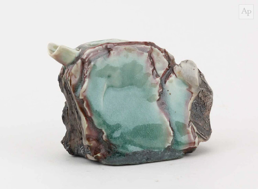 EDDIE CURTIS (born 1953); a stoneware pouring vessel with...