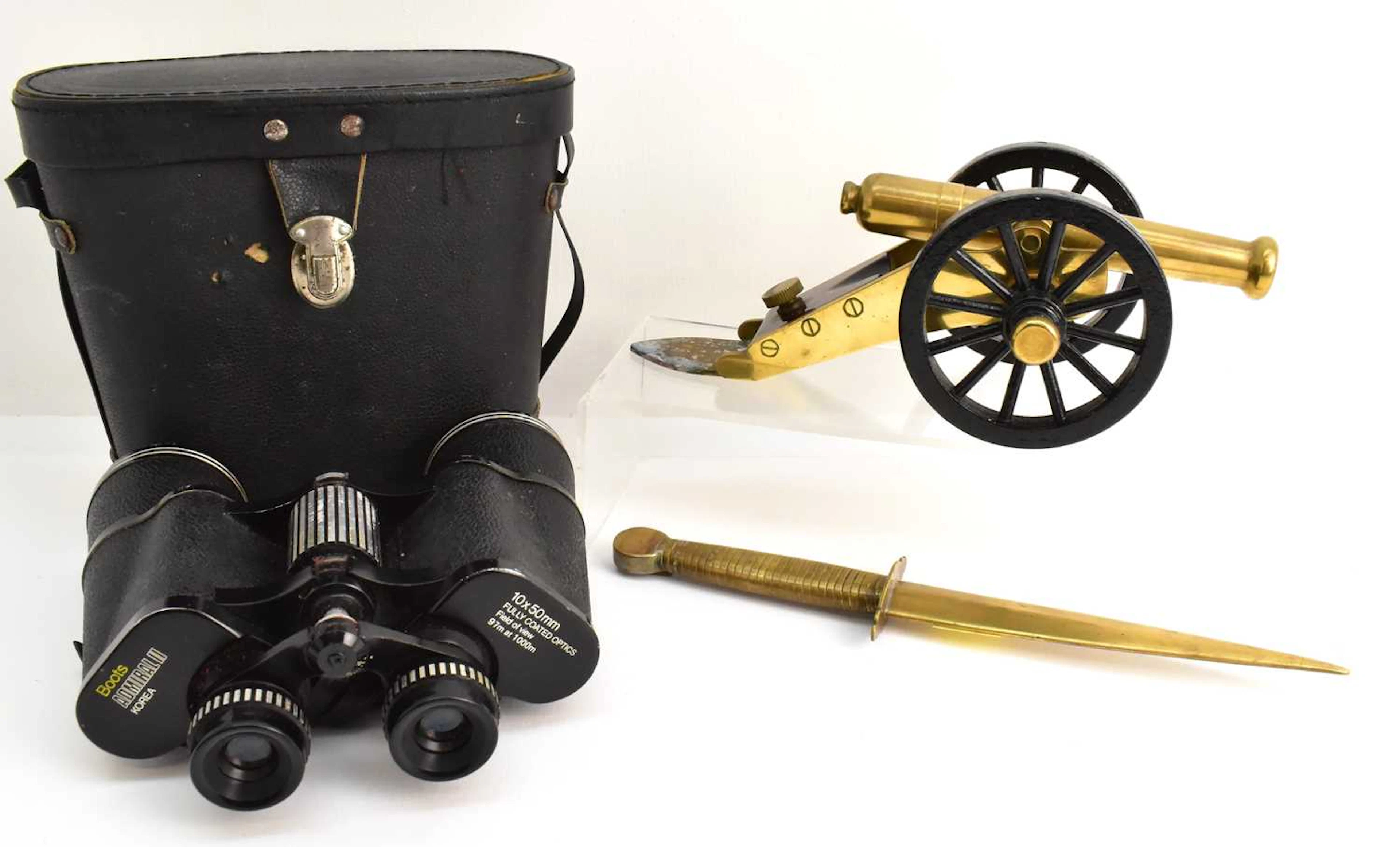 A pair of cased Boots Admiral II 10x50mm fully coated binoculars