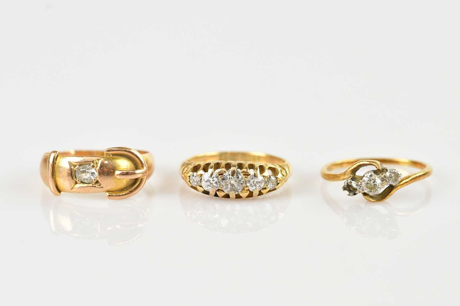 An 18ct gold five stone diamond ring