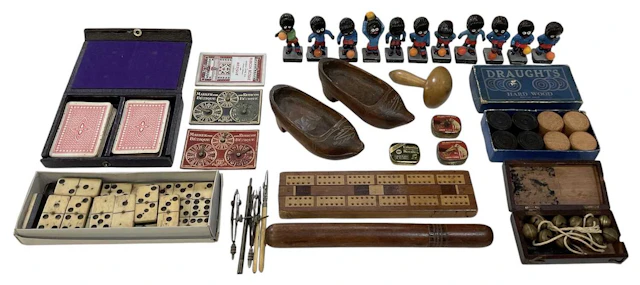 A quantity of collectors' items including draughts