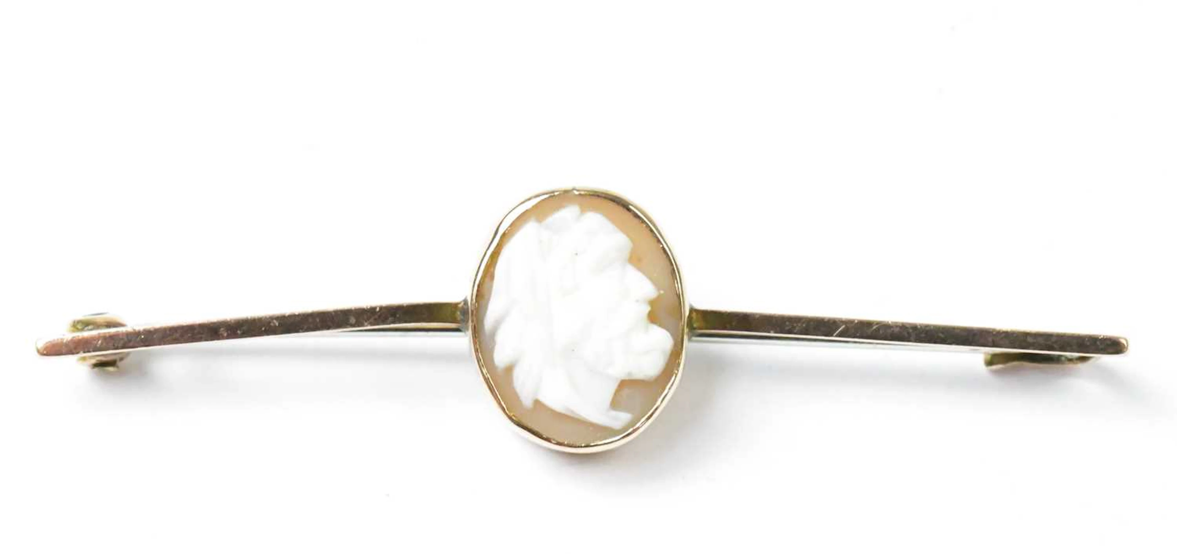 A 9ct yellow gold bar brooch set with an oval cameo...
