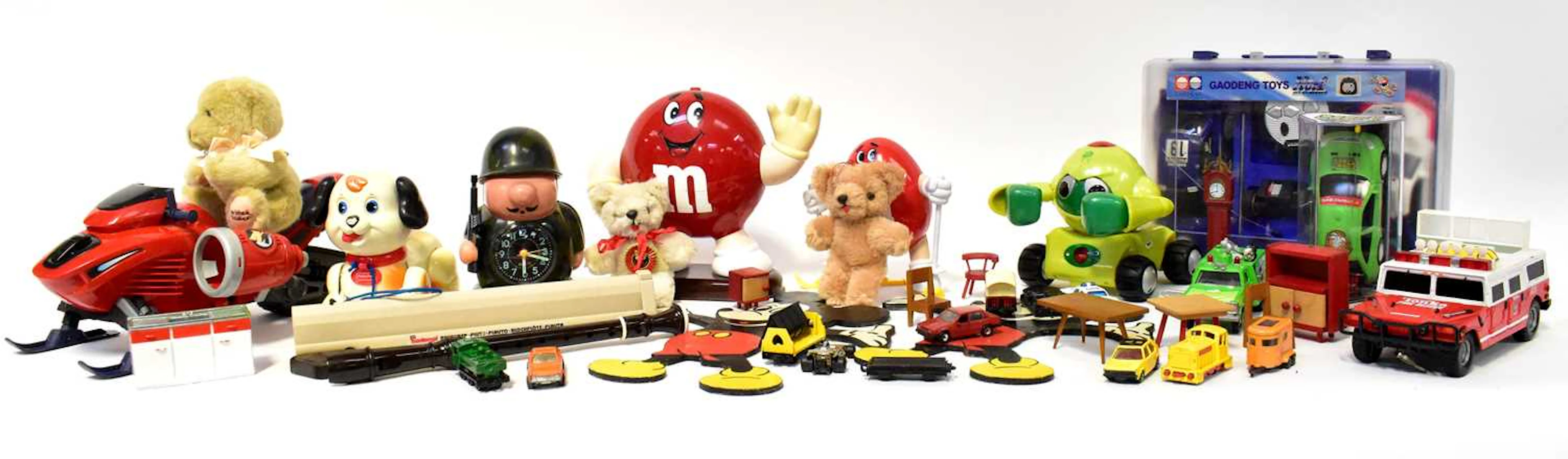 A collection of vintage and retro toys including a pair...