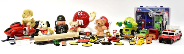 A collection of vintage and retro toys including a pair...