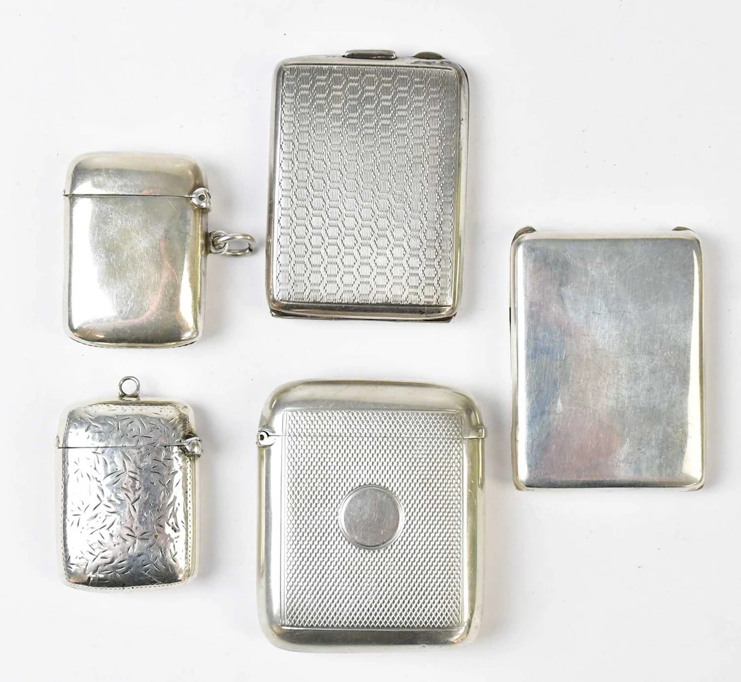 Five hallmarked silver vesta cases