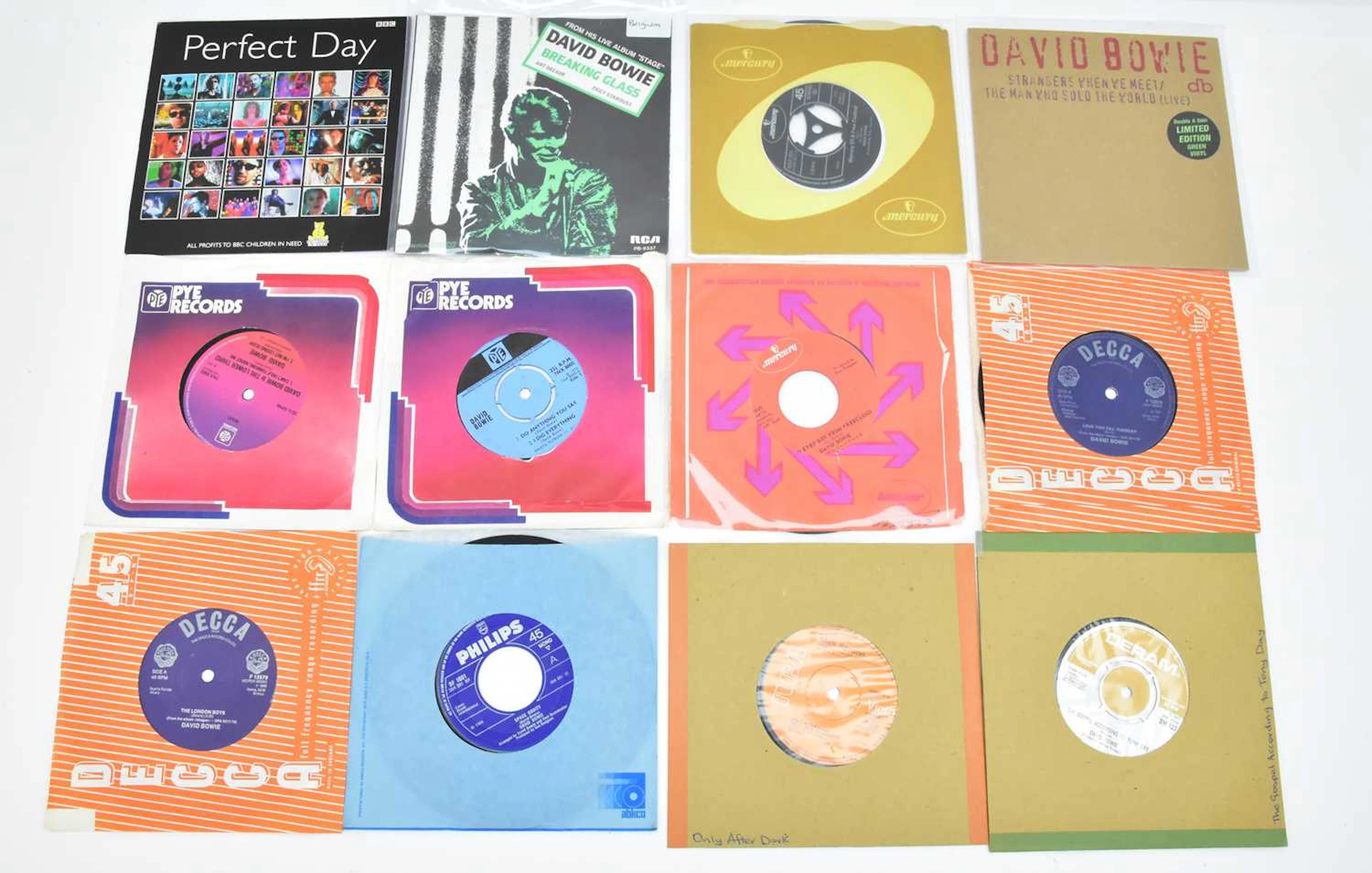 DAVID BOWIE; twelve singles including 'Strangers When We Meet'